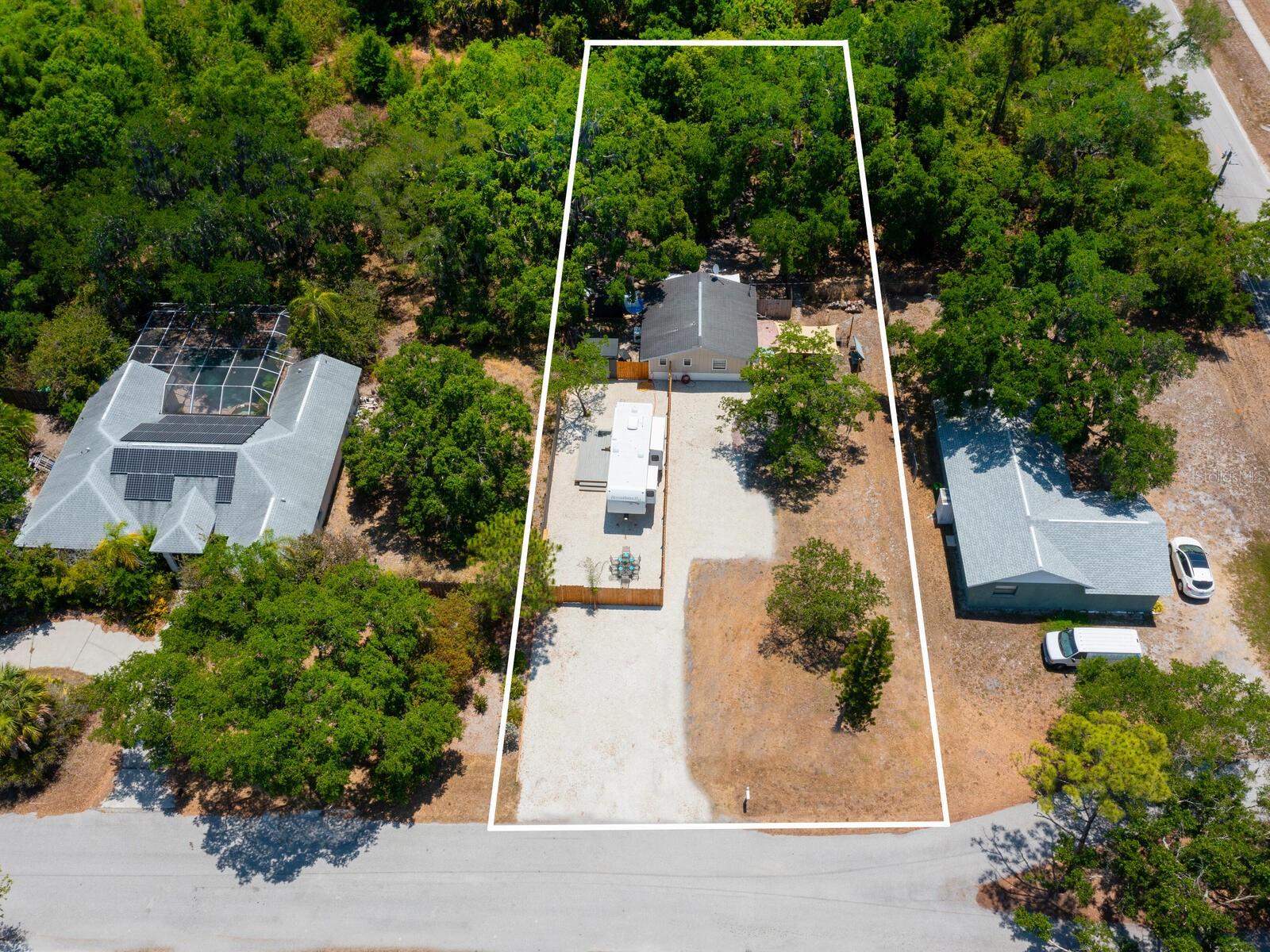 Explore a rare vacant-land opportunity with built-in bonus cottage! Welcome to a unique find in the heart of Sarasota, an oversized ¼-acre lot in the desirable Tobero Woods neighborhood (34235) that opens the door to your vision. Whether you’re ready to build your dream residence, explore multi-home possibilities or simply secure prime land for the future, this property invites imagination and flexibility. On a quiet street, you’ll find this smoothly preserved site features a charming, turnkey one-bedroom, one-bath, 576-square-foot cottage built in 1979, freshly painted inside and out with a new roof, upgraded appliances and a completely cleaned backyard. Use it immediately as an income-producer, guest house or full-time residence while you plan the big build. Zoned RSF2, on a generous lot with mature oak trees, and offering a rare live now while you build later scenario. Live in the cottage, let it pay for itself, and when you’re ready draw permits for the main home, ADU, pool and more. Highlight features include spacious parcel in a desired Sarasota location, more land than most one-bed homes offer. One-bedroom, one-bath cottage with updated tile floors, open layout and move-in readiness. New roof, fresh paint and pristine backyard, turnkey comfort meets future potential. Cul-de-sac setting for tranquility plus convenient to Sarasota’s dining, shopping and the Gulf. Instruments of flexibility such as live now, build later, convert to ADU or rental. Ideal for dream home seekers, land investors, Airbnb hosts (check local zoning/reg), or anyone looking to buy land in Sarasota with an immediate living option. Don’t miss this rare blend of vacant land potential plus immediate cottage utility, a smartly positioned asset in Sarasota’s evolving market.