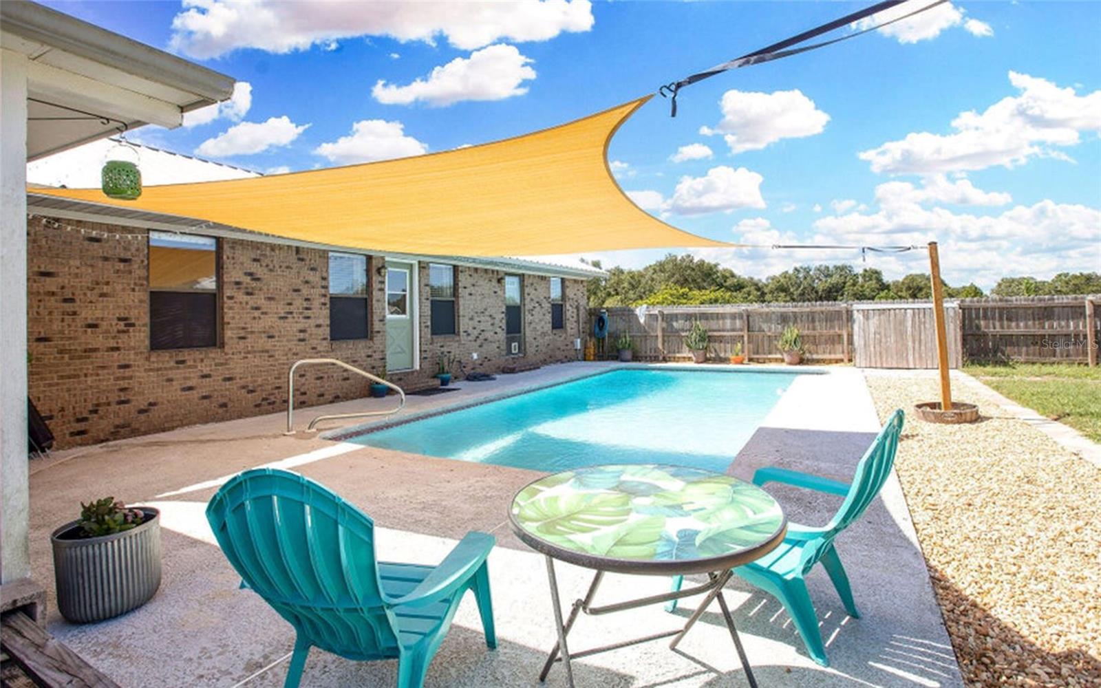 Welcome to Keystone Heights living at its best! This beautifully remodeled turn-key 4-bedroom, 2-bath home offers 1,988 sq ft of comfort, charm, and flexibility. Step outside to your private retreat with a sparkling pool, fenced backyard, fruit trees, crepe myrtles, storage shed, and chicken coop. Bring your boat or jet skis--Lake Hutchinson, a spring-fed lake with sandy beach access through the HOA for just $30 annually, is just a stone's throw away. Updates include kitchen cabinetry, light fixtures, wood-look tile flooring, updated windows, plus a 4-year-old roof and HVAC and updated water heater. Centrally located for an easy commute to Gainesville, Jacksonville, and Middleburg. The house holds more character and beauty than a lens could capture. Schedule your showing today.