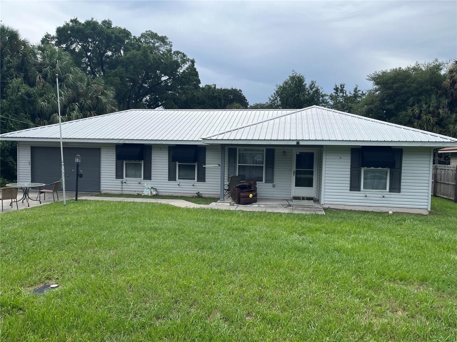 Welcome home to this charming and well-maintained 3 bedroom, 2 bath home nestled in the peaceful community of Silver Springs Woods. Designed for comfortable Florida living, this home features a spacious and functional layout with plenty of room to relax and entertain and is wheel chair accessible. Bathrooms feature walk in showers with grab bars and room for a shower chair.
The kitchen is equipped with newer Stainless Steel appliances, while the newer metal roof and water heater provide added peace of mind. A propane whole house generator ensures you're prepared year round, offering comfort and security during any weather.
Enjoy your morning coffee in the bright Florida room or unwind on the screened patio overlooking the backyard. Need extra space for hobbies, a workshop, home office, or creative studio? The versatile She/He Shed offers endless possibilities. Pet friendly with fully fenced back yard.
Conveniently located near Silver Springs State Park, shopping, dining, medical facilities, and Ocala, this move in ready home combines comfort, functionality, and value. Don't miss your opportunity to make this wonderful property your next home, schedule your private showing today! Additional Photos Soon!!