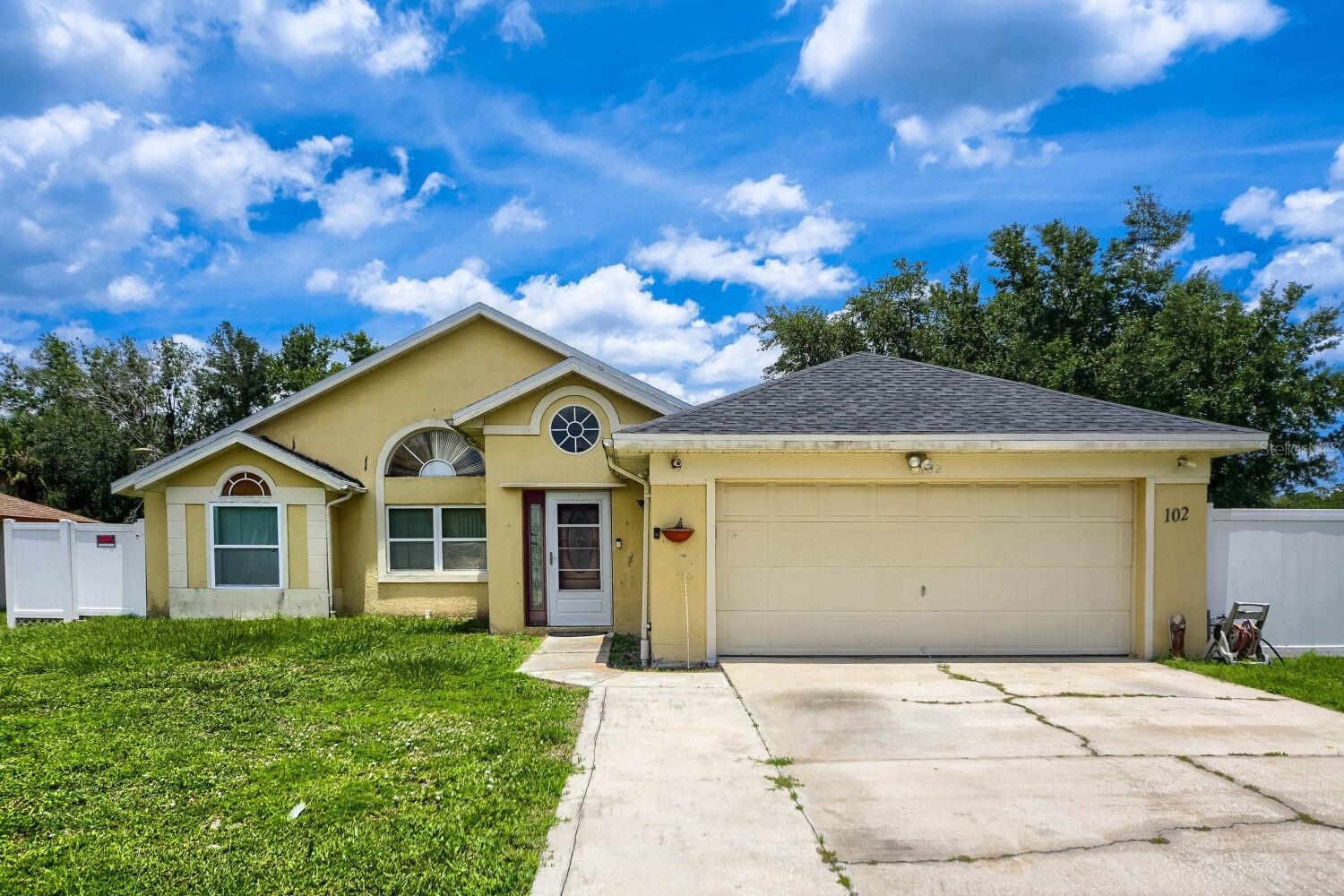 Welcome to this spacious 3-bedroom, 2-bath home situated on a quiet cul-de-sac in the established Poinciana community. Featuring soaring vaulted ceilings, abundant natural light, and a functional split-bedroom floor plan, this home offers comfortable living with plenty of room to make it your own. The spacious living and dining areas provide an inviting atmosphere for everyday living and entertaining. Step outside to enjoy the fully fenced backyard, offering privacy and ample space for pets, play, gardening, or future outdoor enhancements. Complete with a 2-car garage and conveniently located near schools, shopping, dining, parks, and major roadways, this property presents an excellent opportunity for homeowners and investors alike.