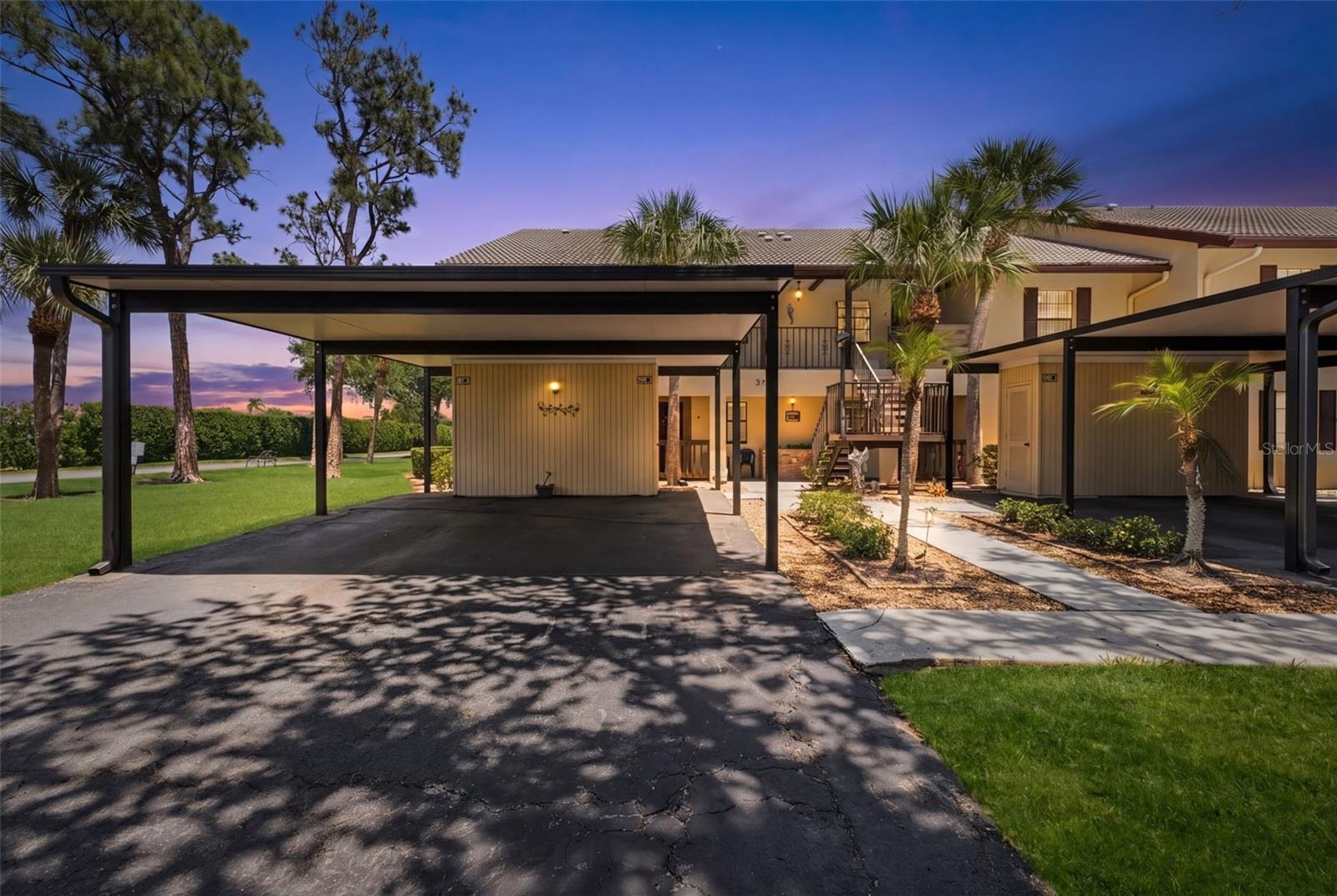 Tucked away in a quiet, private setting, this beautifully updated GROUND FLOOR, END UNIT offers the perfect blend of comfort, convenience, and the Florida lifestyle you’ve been dreaming of. Ideally located in the heart of Venice, this exceptional condo is just 3 miles from historic downtown Venice and the stunning Gulf beaches, where you’ll enjoy fine dining, charming cafés, boutique shopping, cultural events, and breathtaking sunsets.
Step inside to discover a light-filled, inviting interior featuring new tile flooring in the foyer, kitchen, and guest bedroom, and NEWER IMPACT WINDOWS for peace of mind. The spacious great room is designed for relaxing and entertaining, complete with a stylish wet bar and wine fridge. The kitchen is enhanced with granite counters, a new refrigerator (2026) and new stove (2022), while the guest bath features an updated vanity.
Elegant plantation shutters throughout add timeless style, privacy, and abundant natural light to this beautifully maintained condo. 
The generously sized primary suite offers a beautifully updated en-suite bath with dual sinks and a new shower. Additional improvements include a new A/C (2022), new HWH (2025), tile flooring in the lanai, and pavers just outside, creating the perfect space to enjoy the peaceful surroundings.
A newer tandem two-car carport (2023) with storage room, abundant guest parking, and three heated community pools add to the appeal of this rare opportunity.
Whether you’re searching for year-round living, a seasonal retreat, or an investment property, this condo checks every box. Conveniently located near Sarasota Memorial Hospital and medical offices, with easy access to I-75 and four nearby airports, this is truly a piece of paradise you won’t want to miss.