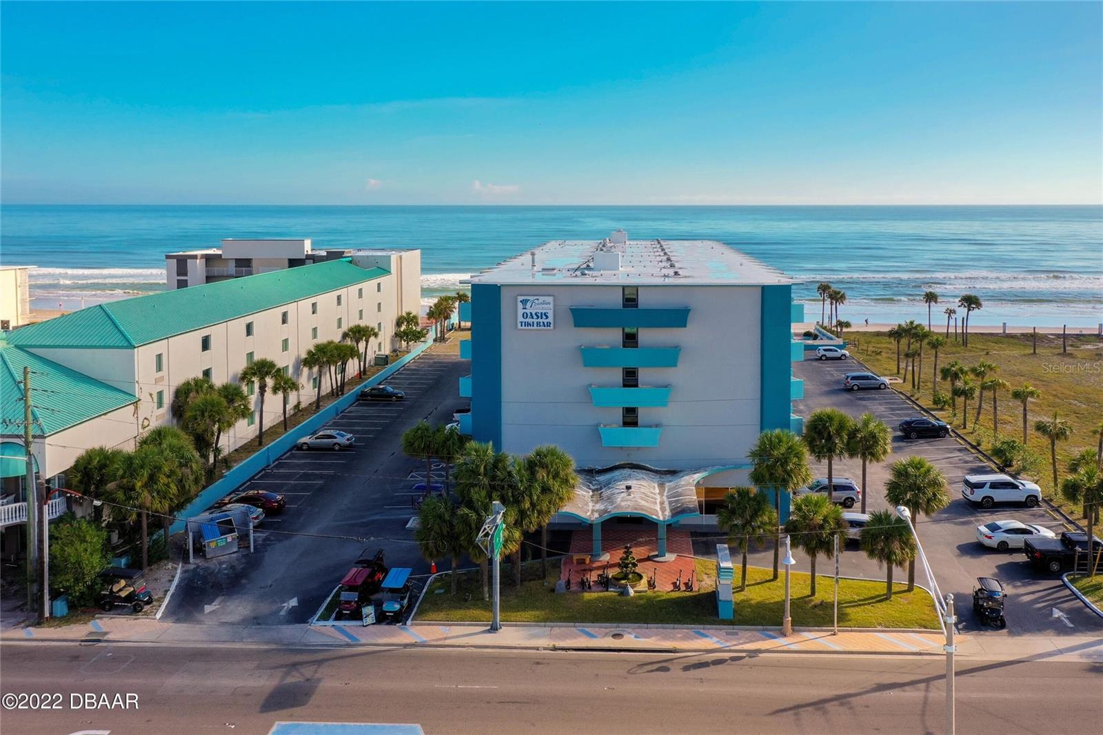 Don’t miss this opportunity to own a fully furnished beachfront studio that serves as both a personal retreat and an income-producing property—and one of the few buildings offering a low monthly condo maintenance fee, helping maximize your return. Zoned for flexible short-term rentals, this unit is ideal for nightly bookings through platforms like Airbnb, VRBO, or private reservations—offering multiple revenue streams.

Inside, this unit features two queen beds and a convenient kitchenette equipped with a refrigerator and microwave. The unit is completely turnkey, including linens, towels, and a TV, making it ready for immediate occupancy or rental. Step onto your private balcony and enjoy stunning ocean views, perfect for morning coffee or evening relaxation. Residents and guests enjoy resort-style amenities at Fountain Beach Resort, including an oceanfront pool, jacuzzi, fitness center, and on-site bar with live music.

Located directly on Daytona Beach—known as the "World's Most Famous Beach"—this area draws visitors year-round with high-demand events such as NASCAR races at Daytona International Speedway, Bike Week, Biketoberfest, Spring Break, and national cheerleading and dance competitions—helping keep rental calendars full and income potential strong.

Whether you're seeking a vacation getaway, an investment property, or the best of both, this beachfront studio delivers.