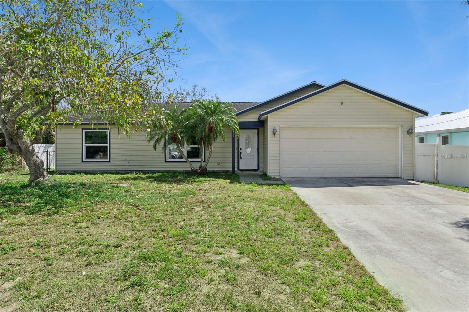 Charming and well-loved 3-bed, 2-bath home in desirable Gatlin Pines—an appealing NO-HOA neighborhood offering flexibility and a relaxed Florida lifestyle. Ideally located east of I-95, close to beaches, shopping, and everyday conveniences.  A welcoming, airy layout features a tastefully updated kitchen overlooking the spacious living area, with a dining space and additional family room arranged within one open, versatile setting. The split-bedroom design provides privacy, with the serene primary suite on one side and two bright guest rooms plus full bath on the opposite wing.  Recent improvements include a newer A/C and water heater, and the generous yard offers excellent potential for outdoor enjoyment or future enhancements.  Nearby schools include Windmill Point Elementary, Oak Hammock K-8, and Bayshore Elementary.  Enjoy comfort, convenience, and the freedom that comes with no HOA—your opportunity to experience the best of Port St. Lucie living.