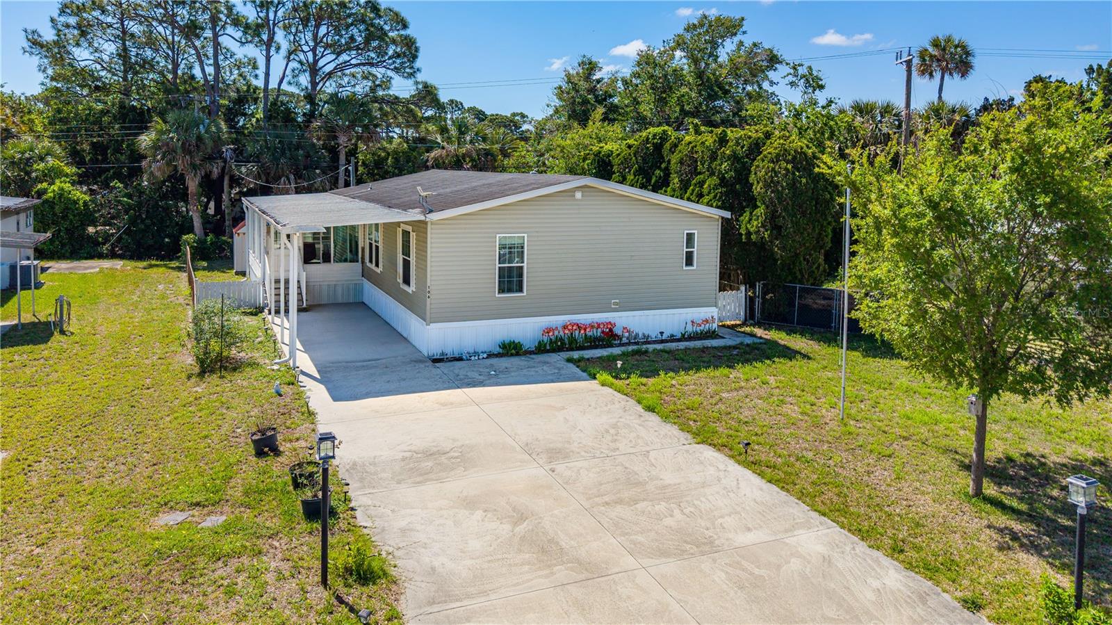 Welcome to Terra Mar Village, a sought-after riverfront community where the land meets the sea. This move-in ready 2016 home sits on an owned lot—no land lease—and offers an impressive combination of comfort, amenities, and coastal lifestyle. Enjoy access to private community features including a boat ramp, fishing pier, two large swimming pools, clubhouse, and bocce ball courts. On-site boat and RV storage is also available. Inside, the home features an open floor plan with split bedrooms for privacy. The spacious primary suite includes an ensuite bath with double sinks, walk-in shower, garden tub, and an oversized walk-in closet. A generous guest bedrooms provide flexible living space. All appliances are included. Outdoor living shines with a large Florida room with large impact windows, a wide two-car driveway, covered carport, fenced backyard, and a storage shed. You’re just steps from the riverfront amenities. Feel secure knowing all residents complete an application and screening process. No age restrictions. Located minutes from beaches, restaurants, shopping, the American Legion, and public parks—plus only 45 minutes to Orlando. This is coastal Florida living made easy.