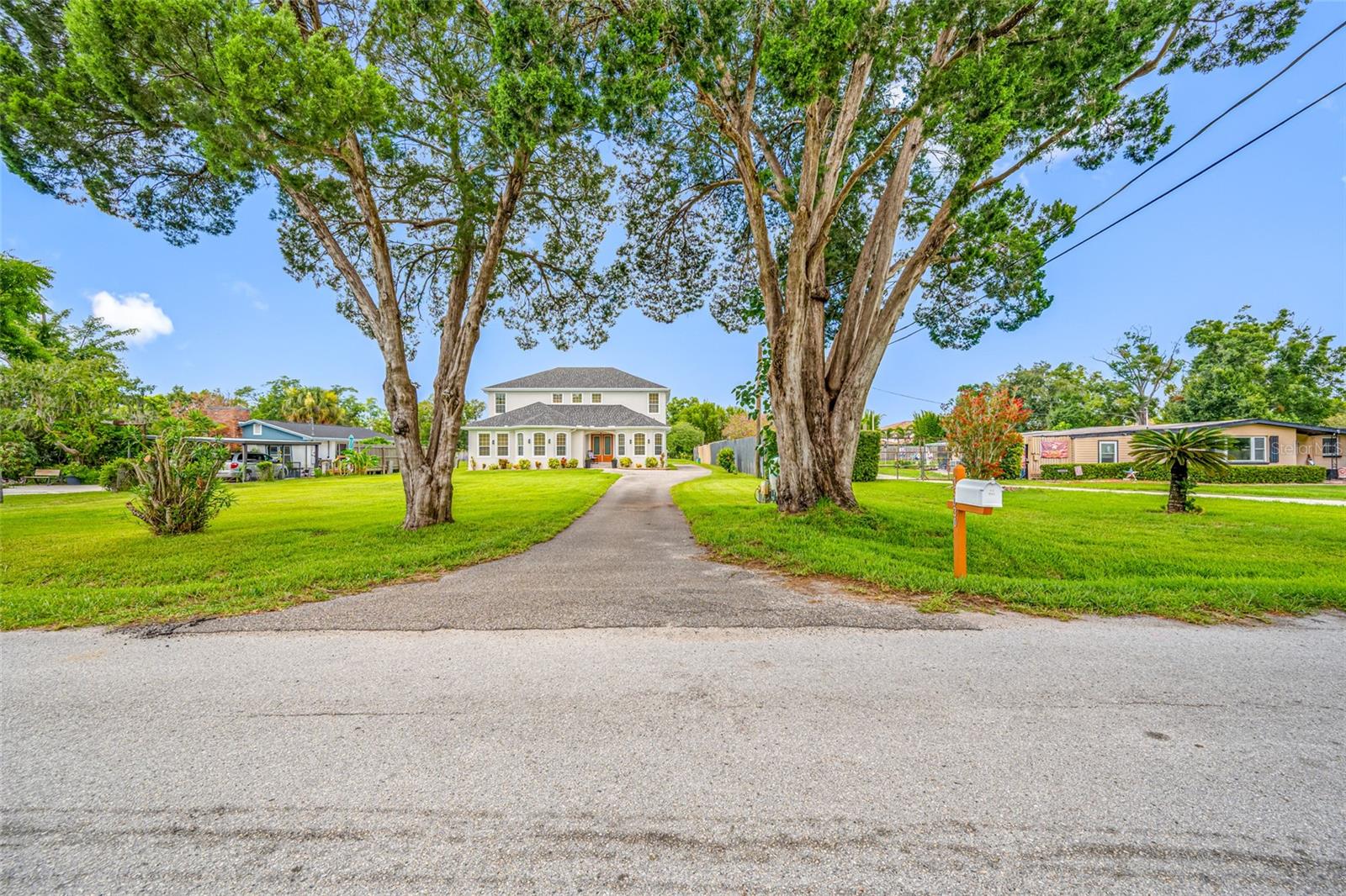 BEAUTIFUL CUSTOM-BUILT HOME LOCATED IN CARROLLWOOD WITH 6 BEDROOMS 4.5 BATHS AND OVER 4400 SQ FT WITH AN OVERSIZED 0.58 ACRE LOT ON A DEAD-END STREET WITH A PARK. THIS HOME IS NOT LOCATED IN A COMMUNITY AND IT HAS NO HOA OR CDD. AS YOU DRIVE THROUGH THE LONG DRIVEWAY AND ENTER THE HOME THROUGH THE MAIN ENTRANCE, YOU'LL NOTICE THE GRAND LIVING AREA. BOTH FLOORS HAVE BAMBOO FLOORING EXCEPT THE BEDROOMS HAVE CARPET AND THE BATHROOMS HAVE TILE. ALSO, BOTH FLOORS HAVE 10FT HIGH CEILING. THE SPACIOUS KITCHEN HAS GRANITE AND IT'S OPEN OUT TO A BREAKFAST ISLAND. THERE IS A FORMAL DINING ROOM AND AN OFFICE/DEN BY THE MAIN ENTRANCE. THE 1ST FLOOR SECONDARY BEDROOM HAS AN EN-SUITE BATHROOM WITH DUAL SINKS AND THERE'RE TWO OTHER GUEST BEDROOMS WITH A GUEST BATHROOM. THE PRIMARY BEDROOM IS LOCATED ON THE 2ND FLOOR WITH AN EN-SUITE AND DUAL SINKS, A LARGE SOAKING TUB WITH A SEPARATE SHOWER AND TWO WALK-IN CLOSETS. ALSO, THERE'RE TWO GUEST BEDROOMS WITH A GUEST BATHROOM AND A VERY SPACIOUS BONUS ROOM. THE OVERSIZED LANDSCAPED LAWN HAS ST AUGUSTINE GRASS IN FRONT WITH SPRINKLERS, THREE-CAR GARAGE IS ATTACHED AT THE REAR OF THE HOUSE WITH A HALF BATH, SEPARATE BRICK WORKSHOP WITH METAL ROOFING BUILT WITH I-BEAM FOR SUPPORT ON ALL FOUR CORNERS AND CENTER. THIS CUSTOM-BUILT HOME HAS PRECAST CONCRETE WALLS ON THE FIRST AND SECOND FLOOR, PRECAST CONCRETE WALLS ON INTERIOR LOAD-BEARING FOR SECOND FLOOR, ICYNENE INSULATION ON FIRST FLOOR FRONT OF HOUSE ATTIC AND SECOND FLOOR ATTIC, ADDED INSULATION IN BEDROOM WALLS FOR SOUND DAMPENING AND FOR BLOCKING NOISE THROUGH WALLS AND DOORS, ROOF WAS REPLACED 8/2026, NEW GUTTERS 6/2025, EXTERIOR PAINT 3/2025, 2ND FLOOR AC WAS REPLACED 6/2023, TANKLESS WATER HEATER USES PROPANE GAS AND WAS REPLACED 11/2018, THERE'S A 250 GAL PROPANE TANK AND IT'S LEASED FROM AMERIGAS. CARROLLWOOD VILLAGE PARK IS LOCATED AT THE DEAD-END STREET AND OFFERS A LOT OF AMENITIES SUCH AS DOG PARK, FITNESS EQUIPMENT, PICNIC SHELTERS, WALKING TRAILS, SKATE PARK, PAVED TRAIL, PLAYGROUND, SPLASH PAD, CHALLENGE COURSE, NATURE CENTER, ARBORETUM, CORN HOLE AND FISHING. ALSO, A SHORT DRIVE THERE'S THE CARROLLWOOD CULTURAL CENTER WHICH IS A COMMUNITY ARTS CENTER THAT OFFERS A VARIETY OF CULTURAL PROGRAMMING, INCLUDING LIVE PERFORMANCES, ART CLASSES, AND EVENTS IN A RENOVATED HISTORIC BUILDING. ALSO, IT FEATURES A MAIN BUILDING WITH A THEATER, STUDIOS, AND A COMPUTER LAB, PLUS A SEPARATE BUILDING CALLED "THE STUDIO" AND HOSTS EVENTS LIKE CONCERTS, ART SHOWS, AND FESTIVALS, WITH SPACES AVAILABLE FOR PRIVATE RENTALS. THIS PROPERTY IS CENTRALLY LOCATED NEAR THE VETERANS EXPRESSWAY, TAMPA INTERNATIONAL AIRPORT, TAMPA BAY BUCCANEERS, TAMPA BAY LIGHTNING, TAMPA BAY RAYS, DOWNTOWN TAMPA, UNIVERSITY OF SOUTH FLORIDA, HILLSBOROUGH COMMUNITY COLLEGE, HOSPITALS, SHOPPING AND RESTAURANTS.
