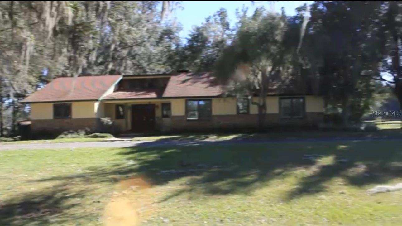Rare opportunity to own a a large 86.7 acre equestrian property, located in NW Marion county, close to the famous 225A in the heart of horse country. Minutes to I-75, WEC, and Hits. Corner lot has magnificent grandaddy oaks providing excellent shade. Currently used for thoroughbred breeding and training, the farm boasts a premier irrigated 5/8 track and starting gate, a 16 stall Concrete block center isle mare barn, a 30 12x12 stall CB training barn with 1 bedroom, 1 bath apartment, office and tack rooms.a third 32 stall CB training barn with 3 tack rooms. 78 Stalls Total. Large European horse walker, 3 round pens, 16 paddocks, 4 Wells, all underground power, high speed fiber internet. All paved roads throughout the farm. 30x40 shop provides ample storage for all the maintenance equipment. The 2100 sq ft pool home sits at the far end of the farm for privacy and has 3 bedrooms 3 full bathrooms, vaulted ceilings, brick fireplace, large kitchen with double ovens, built in induction cooktop. The large master suite includes private master bath with large tub, double sinks and separate shower. Very private large heated inground pool and wooded backyard.