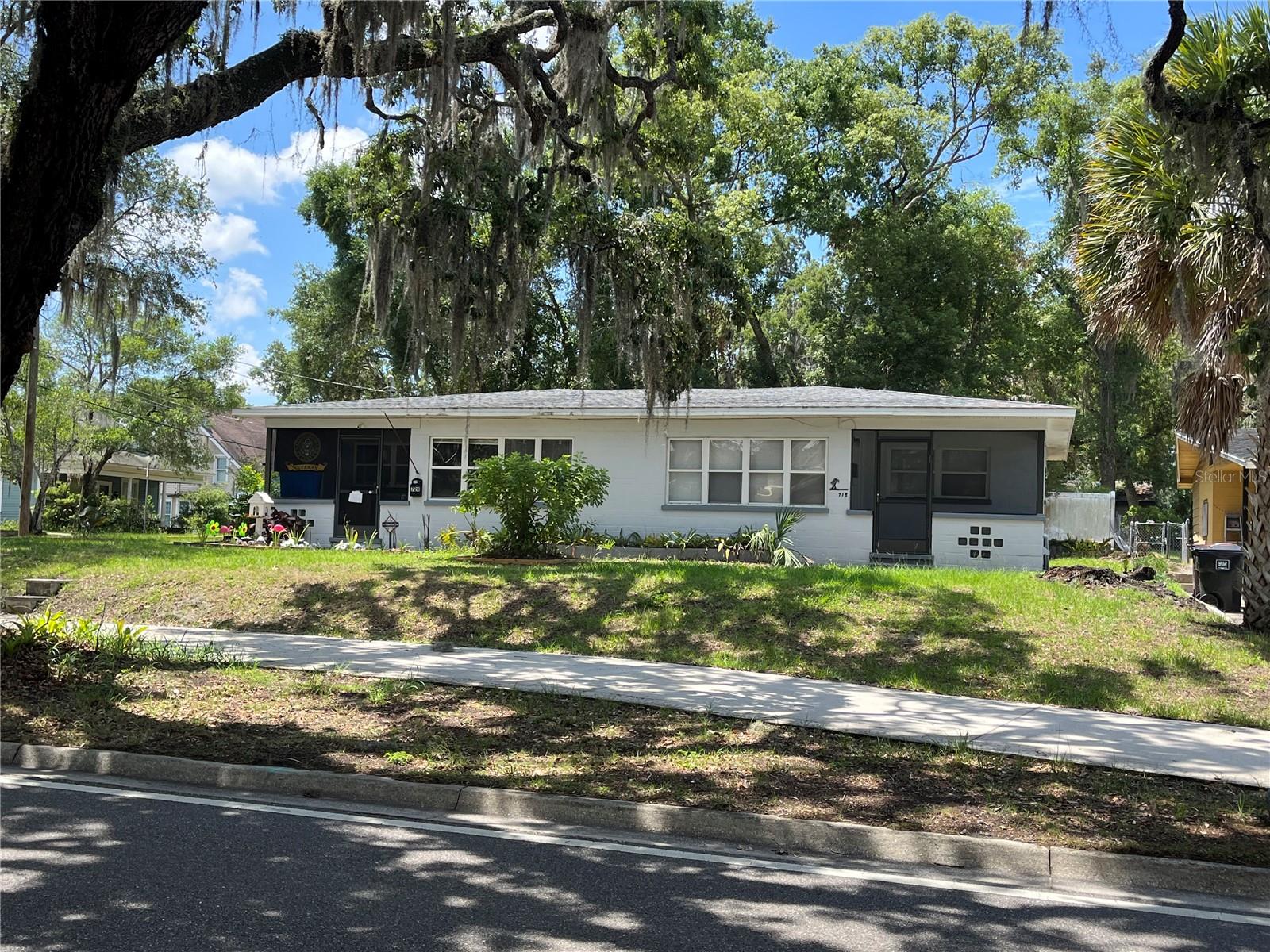 Well maintained duplex downtown close to Lake Eola. Two large one bedroom apartments with eat in kitchens and all appliances including washer and dryer. Apartments are reversed identical units with large living room and bedroom. New roof in 2020 with 2ndary water barrier. Double pane windows and block with plaster walls make these units very quiet. Both air conditioning units replaced in 2023. New carpet, vanity, and stove in 718 unit. Freshly painted. Screened front porches.