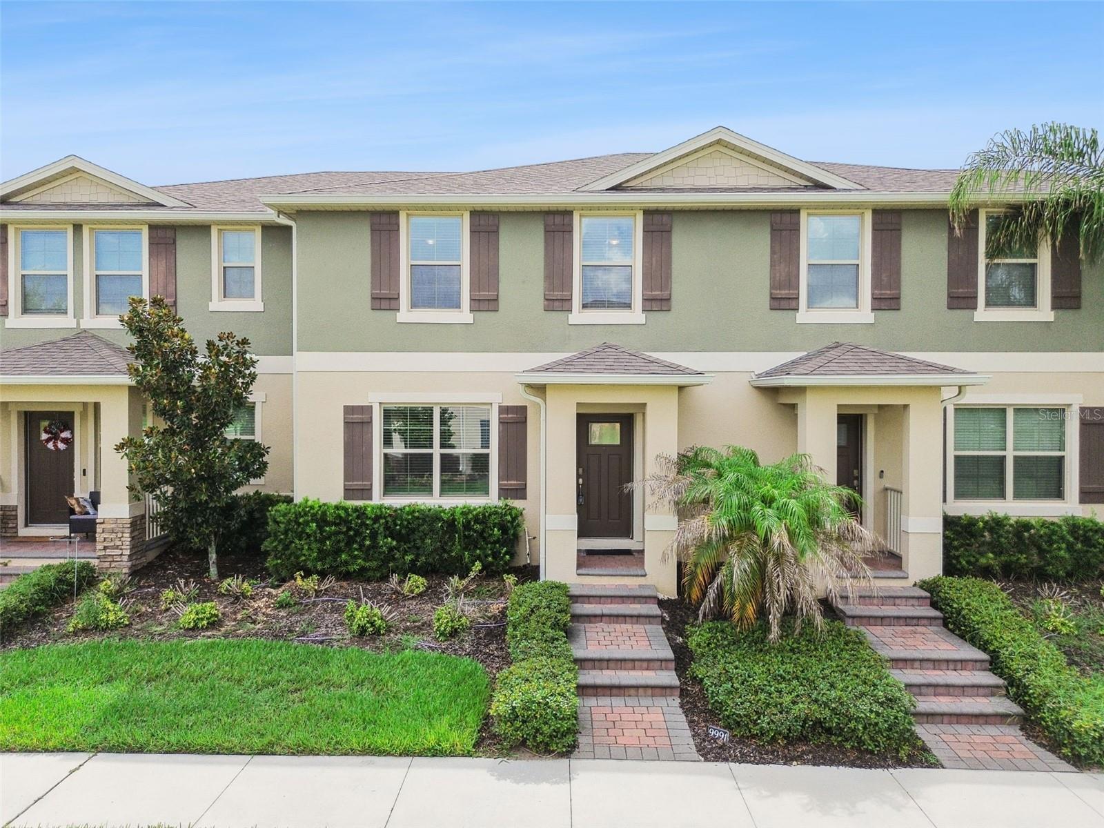 Welcome to Waterleigh where you’ve got the best of Orange County just outside your front door.  The community itself offers TENNIS and PICKLEBALL courts, community POOLS, a FITNESS CENTER, a DOG PARK, CLUBHOUSE, a 6-HOLE MINI GOLF COURSE and PLAYGROUNDS.  LAWN MAINTENANCE IS INCLUDED IN THE HOA DUES.  Plus, Waterleigh is just minutes from theme parks, restaurants, shopping, the 429, I4, and the Turnpike.  The curb appeal is charming and the WATER VIEW is beautiful.  Inside you’ll find an OPEN FLOORPLAN that is perfect for relaxing and entertaining.  The kitchen has GRANITE countertops and STAINLESS STEEL appliances.  The dedicated dining space is open to the spacious living room that spills open to the PATIO.  There’s a half bath downstairs and the laundry closet upstairs for convenience.  The primary suite offers a GRANITE countertop, double sinks, tub and shower plus a large walk-in closet.  The hall bath has a granite countertop with a tub and shower.  Additional upgrades include a NEW AC (2026 with a 10-year warranty), NEW DISHWASHER (2026), CEILING FANS in all of the bedrooms, a built-in bench near the garage entrance, fantastic storage and gutters.  Don’t miss your chance to make this great townhome yours!