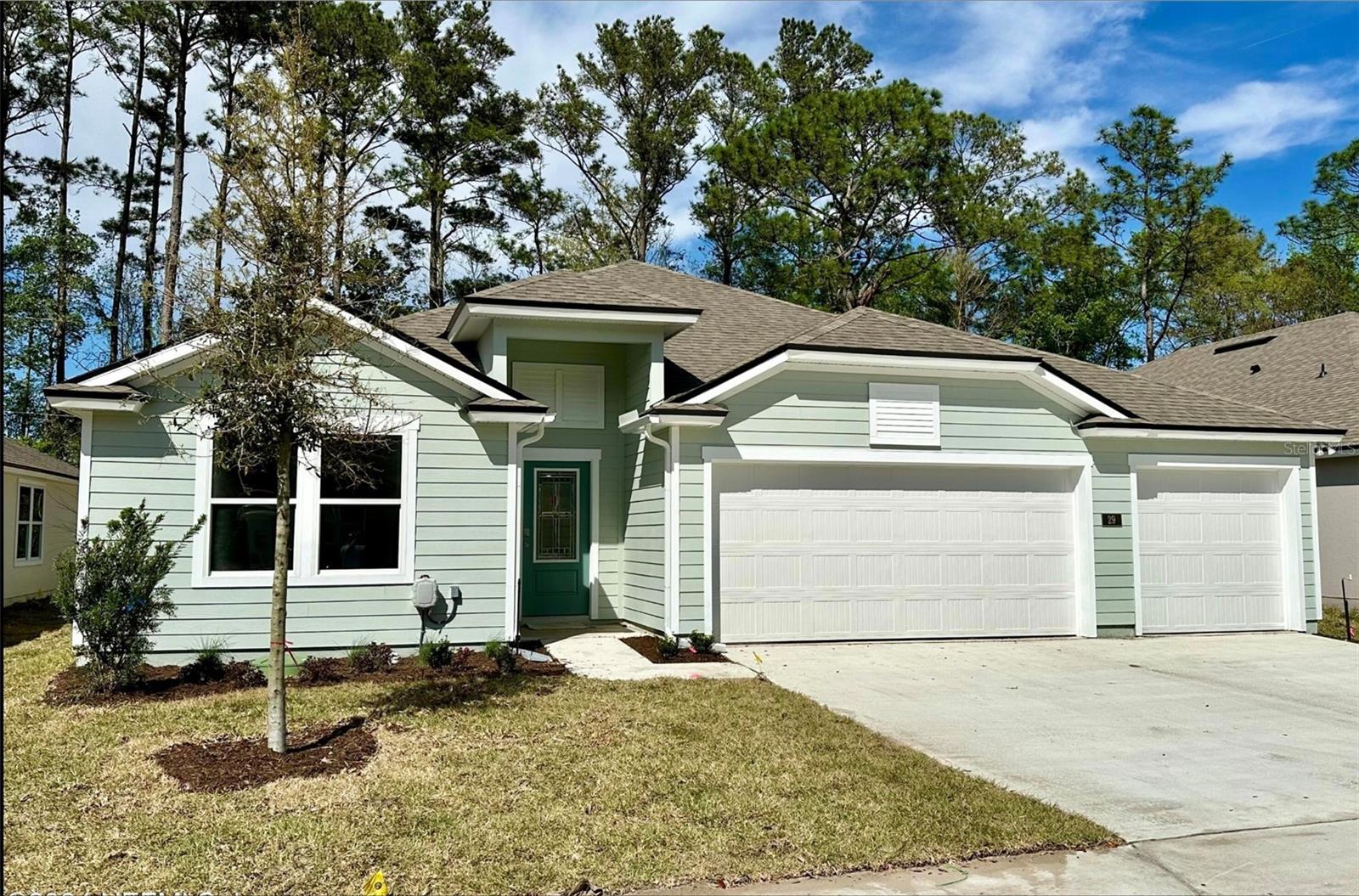ASSUMABLE WITH LENDER APPROVAL - Welcome home to this beautifully designed 4-bedroom, 3-bath residence in the desirable Pecan Ridge community. Offering 2,435 square feet of thoughtfully designed living space and a 3-car garage, this home combines modern comfort with everyday functionality.

The open-concept floor plan is perfect for entertaining, featuring a spacious family room that flows seamlessly into the kitchen and dining area. The well-appointed kitchen offers abundant cabinetry, generous counter space, and an oversized island ideal for meal preparation and gathering with family and friends.

The private owner’s suite serves as a relaxing retreat, complete with a spacious en-suite bath featuring dual vanities, a walk-in shower, and his-and-hers walk-in closets. Three additional bedrooms and two full bathrooms provide plenty of space for family, guests, or a home office.
Step outside to enjoy the covered lanai—perfect for morning coffee, outdoor dining, or simply unwinding after a long day.

Conveniently located near Jacksonville International Airport, River City Marketplace, major highways, shopping, dining, and the beautiful beaches of Northeast Florida, this home offers the perfect balance of tranquility and accessibility. The community also features smart-home technology and an annual HOA.

Don’t miss your opportunity to own this exceptional home. Schedule your private showing today!
