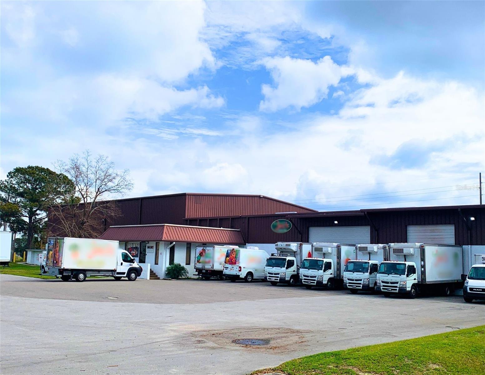 Located in Winter Haven, Florida, just off Lucerne Park Road, this nearly 19,000 SF industrial property is offered for sale as an investment opportunity with a current lease in place.

The property consists of three separate buildings and features three dock-high doors, a semi-truck turnaround, approximately 3,000 SF of refrigerated space, and three-phase power.

The improvements include two warehouse buildings and an 810 SF office space designed for logistics and administrative use.

Situated on ±2.18 acres at the corner of Lucerne Park Road and Bert Schultz Boulevard, the site also offers frontage along Orange County Circle. The property benefits from three road frontages, providing excellent visibility and strong signage and advertising opportunities to the surrounding area.

The building is currently leased through September 2026 with one option to renew for one additional year with no scheduled rent increases.