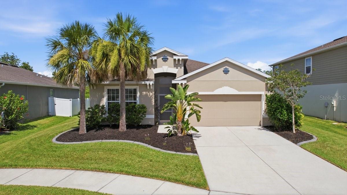 Welcome to this beautifully maintained 4-bedroom, 2-bath home offering 2,022 square feet of comfortable living space in the desirable Retreat at Willow Bend community. Built in 2020, this residence features an open-concept floor plan designed for both everyday living and entertaining. The upgraded kitchen serves as the heart of the home with an extended center island, providing additional seating, workspace, and gathering space for family and guests. Abundant windows throughout the home fill the living areas with natural light, creating a bright and inviting atmosphere. Recent improvements include professionally installed waterproof luxury vinyl plank flooring in the primary bedroom and one secondary bedroom. The spacious primary suite offers a relaxing retreat, while the additional bedrooms provide flexibility for family, guests, or a home office. Step outside to enjoy the covered lanai and extended screened patio overlooking a peaceful conservation area. With no rear neighbors, the backyard offers added privacy and tranquil views of mature trees and natural surroundings. The generously sized backyard provides ample space for a future pool, allowing you to create your own private outdoor oasis. Residents of Retreat at Willow Bend enjoy access to community amenities including a resort-style pool, playground, and basketball court. With no CDD fees and a low HOA, this community offers exceptional value. Conveniently located near shopping, dining, schools, and major commuter routes, and just a short drive from Florida's beautiful Gulf Coast beaches, this home combines modern comfort with a desirable Florida lifestyle.