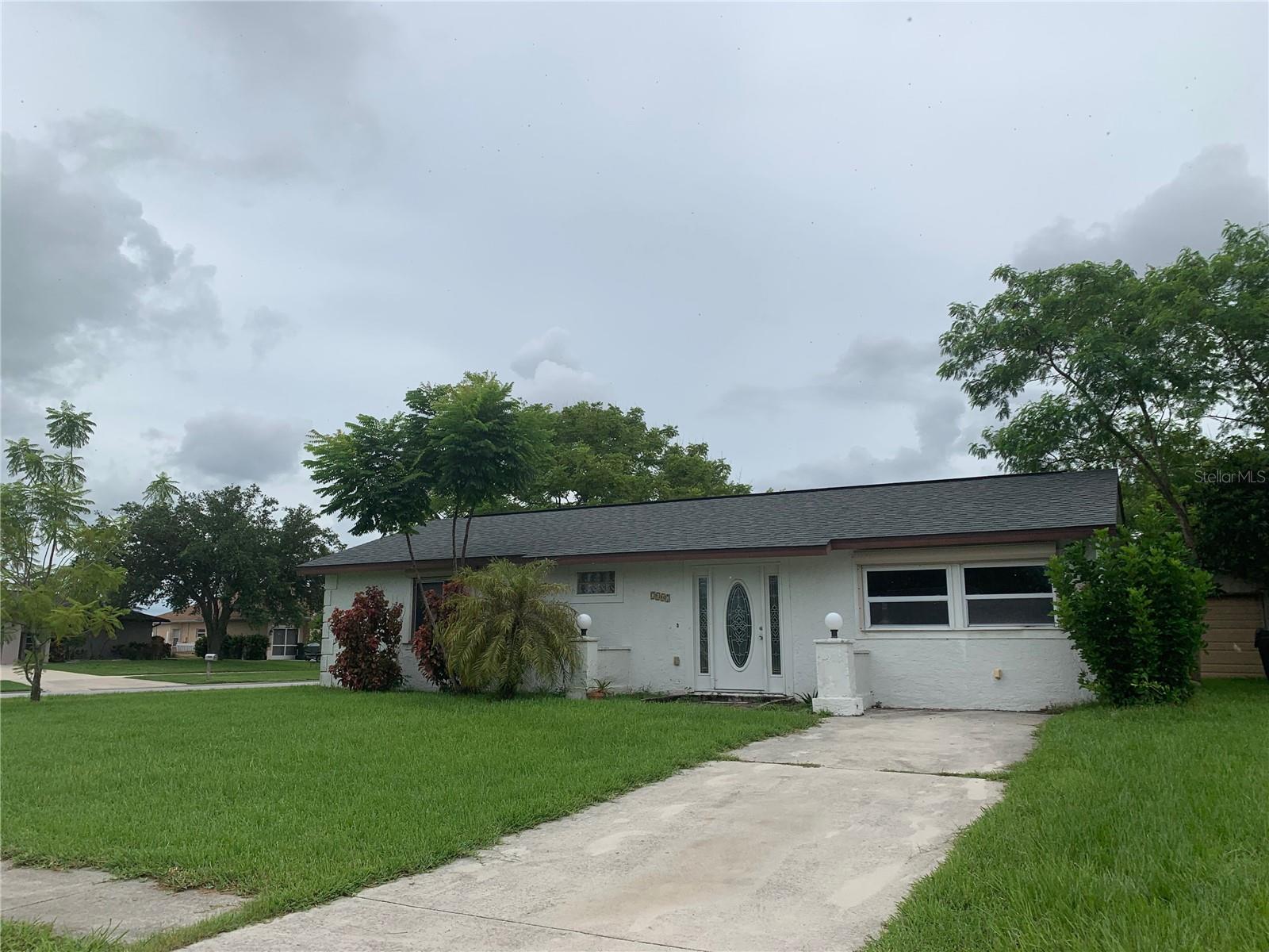 Rent the remainder of November for free with a 13 month lease commitment!
Conveniently located just off US 41, this home sits on a peaceful cul-de-sac where the kids can bike and play. The anglers will appreciate that it is just blocks from the public boat ramp. Through the front doors you will find a home that feels much larger than the sq ft suggests. Living room, updated kitchen, dining area and three bedrooms. The garage was converted and adds a third bedroom with private door and closet space. Updated kitchen with an abundance of cabinet space. Throw open the sliders and enjoy your morning coffee on the lanai. Bring the washer and dryer to the expansive indoor laundry space. Both bedrooms offer the luxury of walk in closet space. No carpet here. Tile and laminate only. Forget the stinky well water, this home is on CITY WATER. Quick walk to community park.