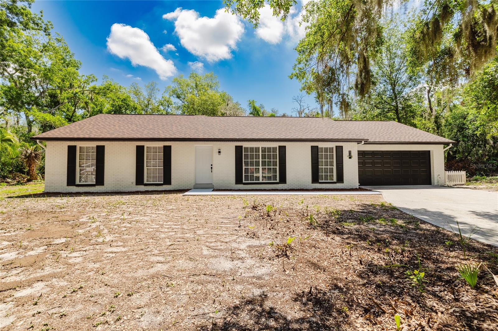 Beautifully updated 3-bedroom, 2-bathroom home in a quiet and well-established neighborhood! This move-in-ready property features updated bathrooms, waterproof laminate flooring throughout, a brand-new kitchen, new appliances, new interior doors, and fresh paint inside and out. Major improvements include a new water heater and a roof replaced in 2023, providing added value and peace of mind. The open and inviting layout offers comfortable living spaces perfect for everyday living and entertaining. Conveniently located near shopping, dining, schools, and major roadways while maintaining the charm and tranquility of a peaceful community. A fantastic opportunity you won't want to miss!