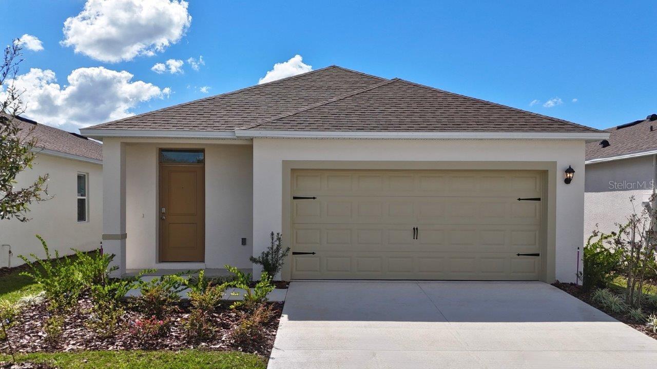 Under Construction. This all concrete block constructed, one-story layout optimizes living space with an open concept. As you enter the foyer you are greeted with a spacious dining room which leads to a spacious kitchen featuring quartz counter tops, stainless steel appliances  and pantry for extra storage. The living room is complete with a view to the covered lanai outside. Bedroom one, located at the back of the home for privacy, has an en-suite bathroom that features a double vanity sink with a walk-in closet. Two additional guest bedrooms and one bath are tucked away down the hall from the Dining Room. The laundry room is located at the front of home near the two-car garage. Like all homes in Magnolia Pointe, the Allex includes a Home is Connected smart home technology package which allows you to control your home with your smart device while near or away. *Photos are of similar model but not that of the exact house. Pictures, photographs, colors, features, and sizes are for illustration purposes only and will vary from the homes as built. Home and community information including pricing, included features, terms, availability, and amenities are subject to change and prior sale at any time without notice or obligation. Please note that no representations or warranties are made regarding school districts or school assignments; you should conduct your own investigation regarding current and future schools and school boundaries.*