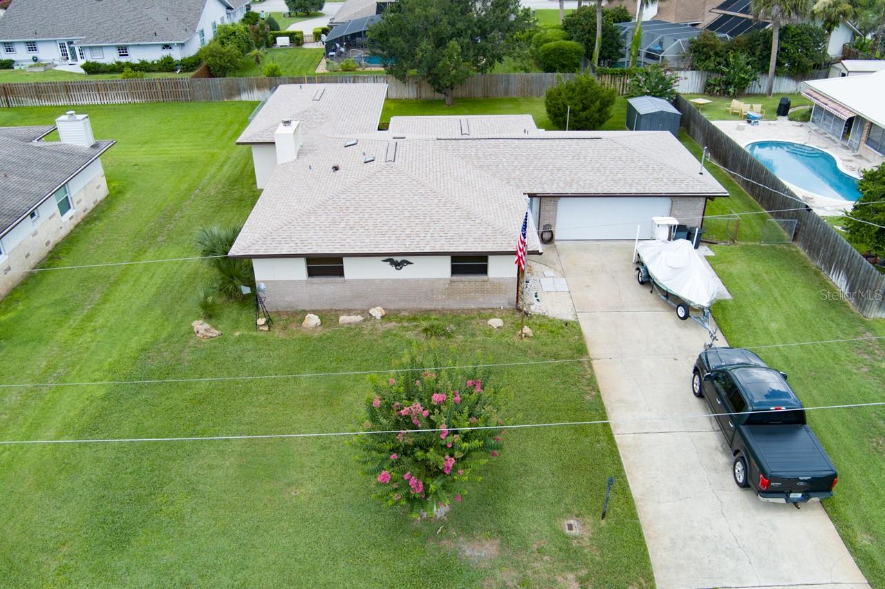 GOLF • BEACHES • BOATING • FISHING • SURFING • FESTIVALS
Discover the perfect blend of comfort, space, and coastal living in this beautifully maintained 3-bedroom, 3-bath home featuring a desirable split-bedroom floor plan. Ideally situated around 3 sought-after golf communities, one designed by legendary architect Donald Ross. Best of all, there are no HOA fees, and you're just minutes from the beach and the Intracoastal Waterway.
The oversized primary suite is a private retreat with a spacious walk-in closet and a luxurious en-suite bath featuring a walk-in shower and relaxing garden tub. The thoughtfully designed open floor plan offers generous living and entertaining space, while the breakfast bar seamlessly connects the kitchen to the living and dining areas. On cooler evenings, gather around the cozy wood-burning fireplace—the perfect setting for family and friends.
The enclosed Florida room, accessible from both the kitchen and the living/dining area, provides additional year-round living space and opens to the backyard and patio, creating an ideal setting for indoor-outdoor entertaining.
Step outside to a beautifully maintained, fully fenced backyard on a high-and-dry 90' x 135' lot with plenty of room to add a pool while still offering ample space for family, pets, gardening, and outdoor activities. The oversized 2-car garage provides abundant storage and features convenient stair access to the attic for even more storage.
Experience the very best of Florida's Fun Coast with championship golf just outside your door and the drive-on beaches of New Smyrna Beach only minutes away—home to some of the finest surfing on the East Coast. Enjoy easy access to the Intracoastal Waterway for boating, kayaking, paddleboarding, and world-class fishing, along with nearby shopping, dining, parks, and endless outdoor recreation.
Conveniently located with quick access to I-95, you're approximately one hour from historic St. Augustine, Orlando's world-famous attractions, Merritt Island National Wildlife Refuge, and Cape Canaveral. Watch spectacular rocket launches from the beach, along the river, or even from the comfort of your own backyard. Just minutes north, enjoy the excitement of Daytona Beach, NASCAR racing at Daytona International Speedway, and the world-famous Bike Week and Biketoberfest events. Explore nearby Canal Street and historic Flagler Avenue in New Smyrna Beach, known for their vibrant art galleries, boutique shopping, outstanding restaurants, and year-round festivals. From seafood festivals and art shows to concerts and holiday celebrations, there's always something happening to make every weekend an adventure.
This exceptional home offers the perfect combination of comfort, convenience, recreation, and the relaxed Florida coastal lifestyle you've been dreaming of.