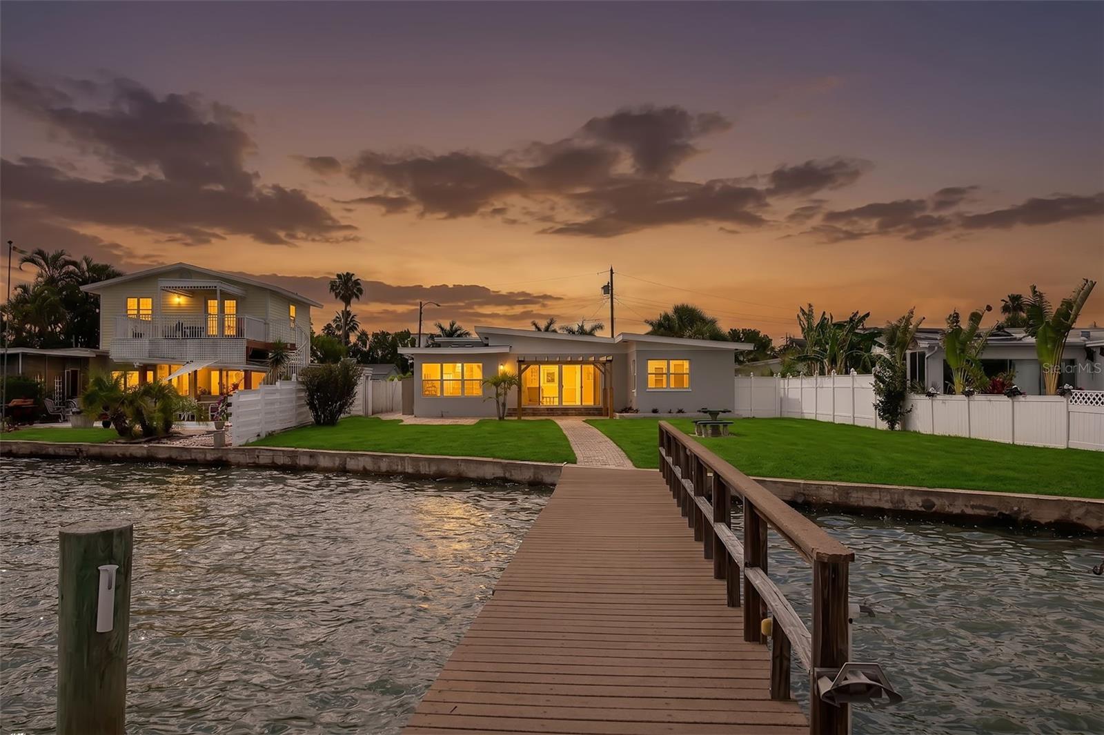 “Prime waterfront” Perfectly positioned, oversized 60x152 lot, front and center on the wide-open waters of the Intracoastal Waterway with direct access to Boca Ciega Bay and the Gulf. Features a 60’ dock ,74'of DEEP waterfront and an open-air spacious back yard *** 3 Bedroom/ 2 full baths ALL tastefully Updated throughout with a bright, comfortable floor plan and abundant natural daylight. All newly Updated, Upgraded, and Up to you to add your personal touches. *** New A/C system, New Water heater, all new kitchen appliances, New front load washer/Dryer, New window treatments with custom electric remote controlled window shades, recessed lighting, all new landscape with new irrigation system. ALL NEW Driveway Pavers. New interior paint. Newly updated enclosed 345 sq./ft screened-in front porch. Just a perfect waterfront setting. A must see to appreciate. Start new and enjoy. Minutes to the beach, shopping, restaurants, a perfect location in Bay Point Estates in Madeira Beach. Schedule your private showing. Note: A few photos were staged with furnishings to give an idea.