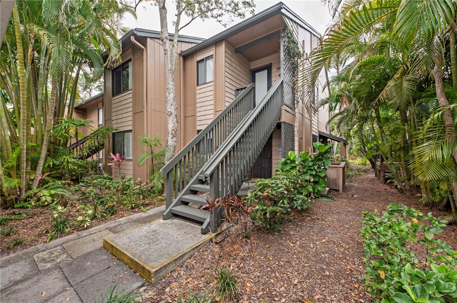 This ground floor 1bed/1bath glenhouse condo has an abundance of light due being an end unit. The main living area overlooks a private preserve, providing the sought-after Florida indoor/outdoor lifestyle and is located within walking distance to Pavilion, where owners enjoy concerts/movies and social gatherings. This condo is located within Pelican Cove, one of Sarasota's most popular gated, waterfront complexes. The marina offers 85 slips for sailboats and powerboats up to 40 feet with direct access to the Bay and ICW. For quiet watersport lovers there are storage racks and launches for kayaks, canoes and paddleboards. Enjoy six heated pools, three clubhouses, tennis and pickle ball courts, gym, yoga classes, music series add to the resort lifestyle, fully equipped woodwork shop, art studios, PC University and many resident-run recreational clubs and activities while living in Pelican Cove.