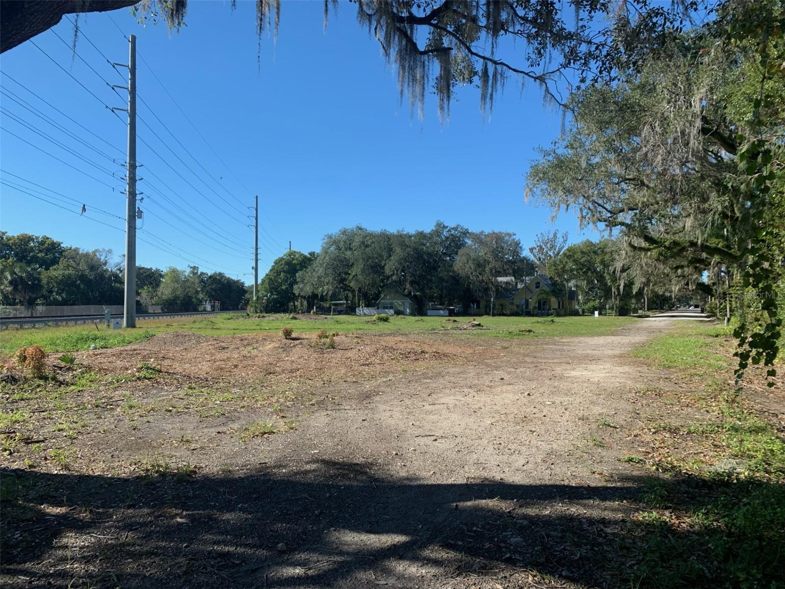 Two lots combined, approximately .82 of an acre (Tax ID 28-25-29-1681-0001-0010 and 28-25-29-1681-0001-0020) in Downtown Kissimmee. Ideal location for the development. The City envisions 3 Story Height buildings with Commercial or Residential Zoning. It is T40 zoning which allows up to 20 units to the acre with lakeview, current zoning residential. Located two blocks to the Osceola County Courthouse, and just one block to the Kissimmee Lakefront Park, Big Toho Marina, and fishing. Do not miss this opportunity! Bring your plans!