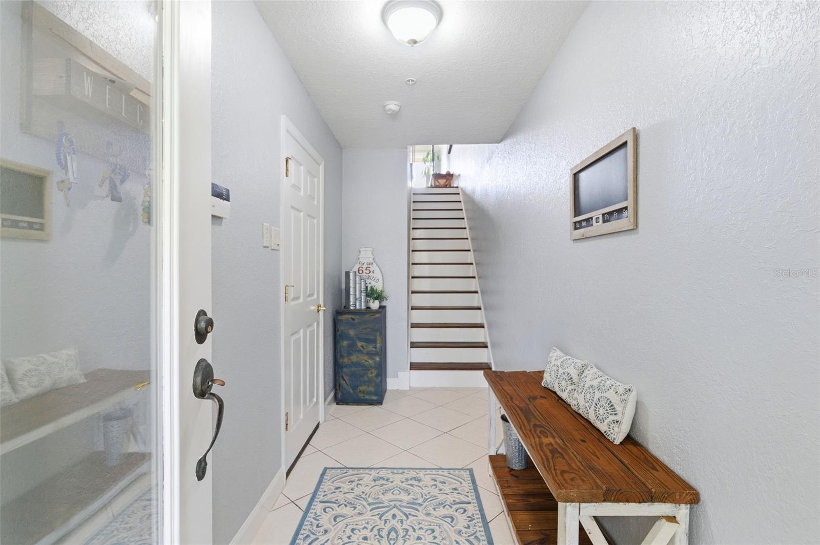 Come and tour this cozy 3 bedroom, 3 bathroom  waterfront townhouse and you will quickly see how easy it is to embrace the lifestyle that makes Florida living so desirable. This 1834 sq ft, 3 level townhouse delivers comfortable maintenance free living in a space where you can be in for years to come.  Soak in endless water views as you sip your morning coffee or unwind with a good book, from  2 balconies to choose from.  Sky lights brighten up multiple spaces in the home capturing natural night. Enjoy a slice of your own paradise with this sensible buy!” Not only does it give you endless water views, private tennis courts, playground, community pool area, this gated community also Includes your own deeded dock with a new seawall.   The garage can fit up to 3 vehicles providing abundant storage.