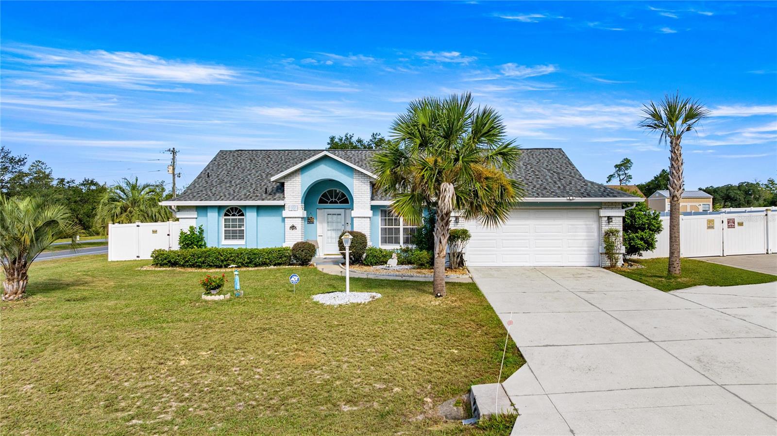 Welcome Home! Brand New Roof in September 2025! Pride of ownership is evident throughout this amazing property. NO HOA! Features 4 bedrooms, 2 full baths and 2,153 sq ft of living space located on oversize corner lot. Fresh paint inside and out with new sliding glass doors. Features gorgeous new flooring throughout with herringbone pattern and a magazine quality new dream kitchen await you. The foyer opens to formal living and dining rooms as well as a large family room off eat in kitchen. Chefs will love to cook in this beautiful space with 42" soft close cabinets with crown molding, new appliances, sink, granite countertops. Hallway leads to 3 spacious guest rooms and second bath. Baths have also been updated with new vanities, backsplash, shower tile, toilets, new flooring and lighting. The backyard is an oasis with something for everyone. The large screened lanai is perfect for entertaining plus new paver patio outside. The backyard is completely fenced with vinyl privacy fence. The side yard has a separate fenced dog run area. Bonus feature of large RV parking pad behind fence with double gates and electrical hook up, as well as extra driveway parking for the whole family or to store boat or trailers, etc. There is also a shed for all of your storage needs. In the evenings after sunset, solar lighting accentuates the outdoor entertaining area. Great SW location, minutes from I-75 for easy commuting. Close to shopping, dining, and entertainment. Schedule your showing today and start enjoying everything this amazing property has to offer!