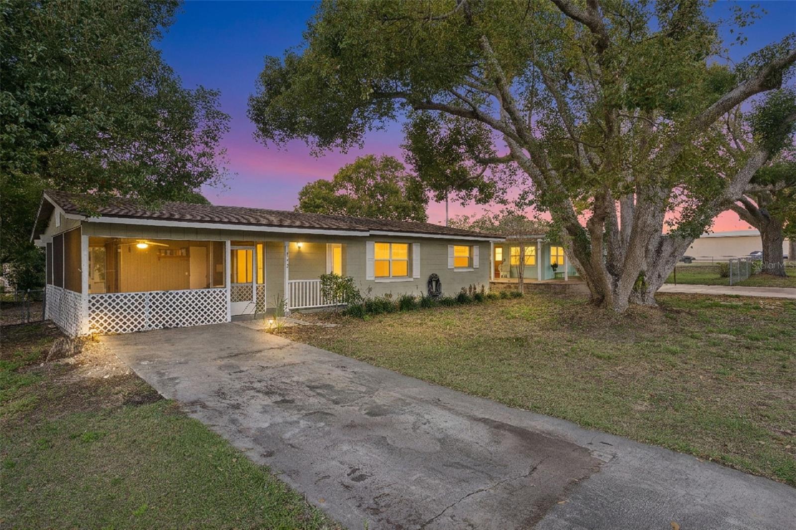 Adorable, refreshed, and freshly painted 2-bedroom home with an additional office/flex room (perfect for a third bedroom, home office or guest space) and 1 full bath!  Move-in ready!!

This absolutely charming single-family home features over 300 square feet of covered and screened lanai space — ideal for relaxing or entertaining year-round.

Recent updates include:
 • Roof replacement (2020)
 • HVAC replacement (2020)
 • Water heater replacement (2020)
 • New vinyl sliding and glass doors
 • New dishwasher
 • New blinds
 • New lattice work
                New Refrigerator

Enjoy updated wood laminate flooring throughout and a well-equipped kitchen with an adjoining laundry room for added convenience. 

The living and dining areas flow seamlessly through sliding glass doors to the spacious screened lanai, bringing in natural light and expanding your living space.

Step outside to a fully fenced backyard — your own private oasis — with plenty of room to unwind, garden or entertain.

And best of all… No HOA!!!

Come home to comfort, charm and privacy! Wonderful home in a fantastic location.