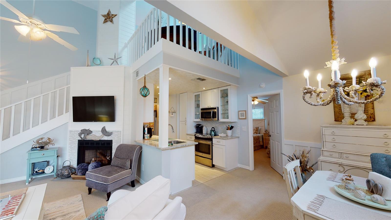 Gorgeous FROM ceiling to floor, nothing in this unit has been overlooked. Located beachside in NSB this 2 bedroom, 2 bathroom has so much to offer and even has a ocean view from the master bedroom. The unit offers vaulted ceiling, skylights, stainless steel appliances, granite counter tops, fireplace, with an front entry balcony and to top it all off it is being sold furnished! Directly across A1A you have a short walk over to the public beach access.   The HOA fee covers the building insurance, common areas, basic cable & internet, & pool.  Call and schedule your showing TODAY! All measurements should be verified for accuracy. ;Water: City