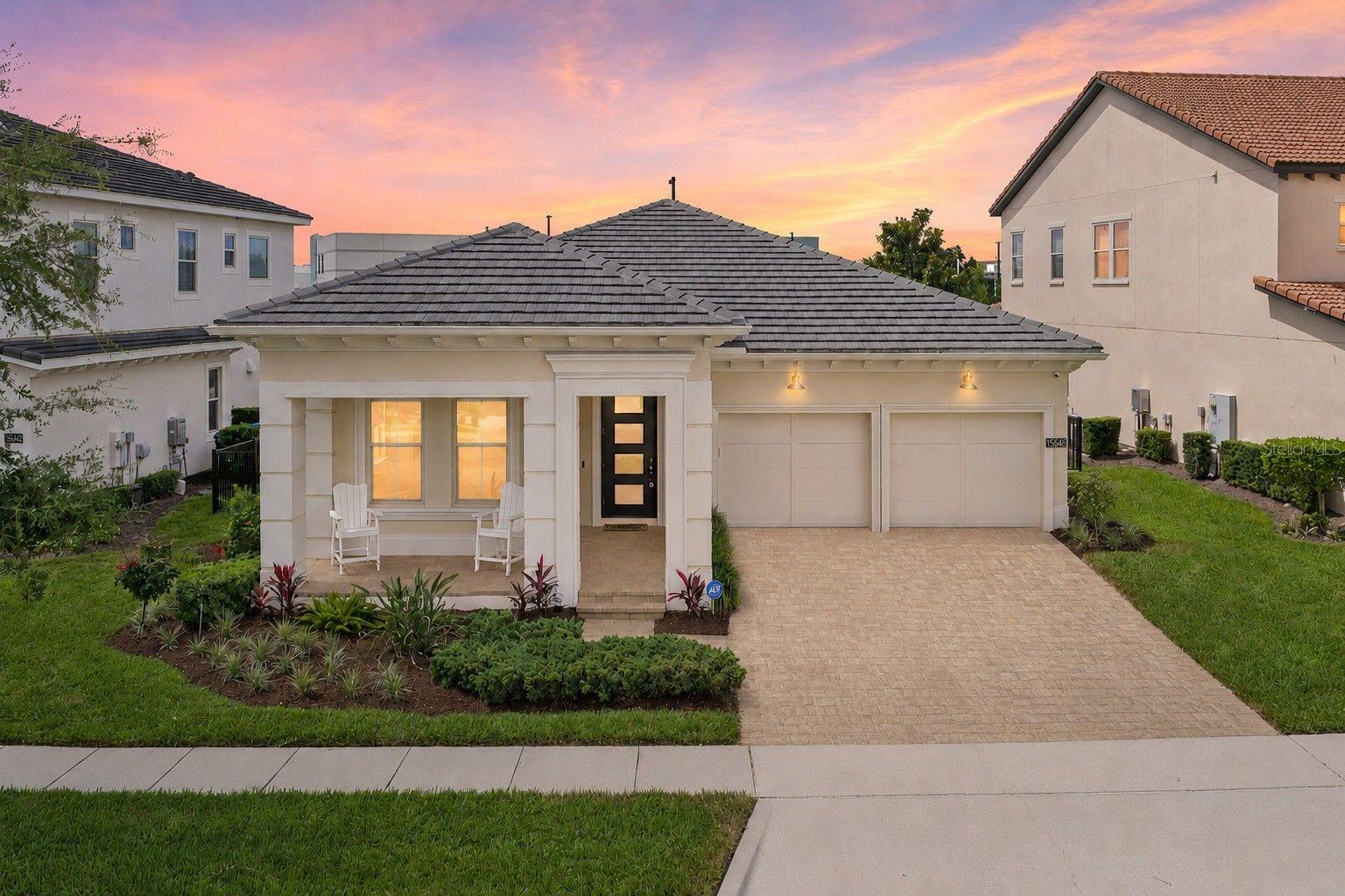 Virtually Staged. Welcome to 15648 Shorebird Lane, a like-new Toll Brothers home in the highly sought-after Lakeshore Preserve community in Winter Garden's premier Horizon West corridor. This beautifully maintained 3-bedroom, 2-full bath, offers 2,170 sq ft and a 2-car garage. The perfect blend of quality craftsmanship and modern living, all in move-in-ready condition. Inside, rich hardwood floors flow seamlessly through every single room, setting the tone for the home's warm and sophisticated feel. The gourmet kitchen is a true showpiece, featuring a gas stove, crisp 42" white cabinetry, gleaming quartz countertops, and stainless steel appliances, all backed by an extended appliance warranty. The luxury master bath includes a beautiful pebble design with rainforest shower. The open-concept layout is filled with natural light and flows effortlessly to the covered lanai and fully fenced backyard, your private Florida oasis for relaxing or entertaining. As the sun sets each evening, step outside and watch nightly Walt Disney World fireworks light up the sky. An ADT security system and an EcoWater whole-home water softener add peace-of-mind living from day one. Lakeshore Preserve is more than a neighborhood, it's a resort lifestyle. The Lakehouse amenity center sits lakeside overlooking 76.5-acre Panther Lake, offering residents a resort-style pool with splash pad, fitness center, yoga room, social space with catering kitchen, fire pit, summer kitchen, sand volleyball, playgrounds, dog park, kayak and paddleboard launch, and walking trails. The HOA covers 1-gigabit internet, cable TV, and lawn care. The location is unbeatable. Hamlin Town Center with upscale dining, shopping is minutes away. Convenient commuting access to major freeways like State Road 429, connects you quickly to Florida’s Turnpike and I-4. Walt Disney World, Universal Studios, and SeaWorld are all within 30 minutes, as are Restaurant Row and Orlando International Airport, Top-rated Orange County Public Schools — Panther Lake Elementary, Horizon West Middle, and Horizon High School — are zoned for this address (verify with OCPS). Private school options like Foundation Academy and Windermere Prep are also close by. *Aerial photo property lines are an estimate and to be verified by buyer.
