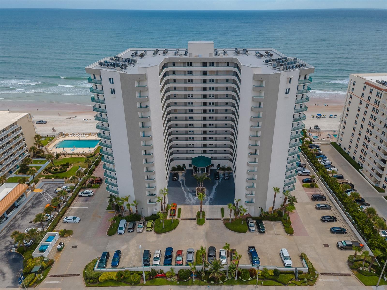 Turn Key! Offered Fully Furnished! Pet Friendly! Unbelievable opportunity to own this vast 3 bedroom, 3 bath condo in a first-class oceanfront community. The Towers Grande offers 2 large heated oceanfront pools, 2 hot tubs, 400 feet of pristine beach and lush tropical landscaping. Amenities include an impressive clubroom, billiard table, library, state of the art fitness center with direct ocean view, private beach access and secure reserved underground parking. On-site management provides peace of mind when you are away. Upgraded kitchen boasts granite counters and ample space for cooking and entertaining with a separate dining area. The unit is beautifully decorated, includes washer and dryer and comes with Hurricane shutters on all windows and sliding doors. Enjoy the breathtaking views of the ocean and intracoastal waterway on your 45 foot wrap around balcony. Come relax by the pool and enjoy the Florida lifestyle with breathtaking sunrises and sunsets. Enjoy the lazy days of summer while fishing, boating, or just a day at the beach. Over 2,000 square feet of living space in this condo which has been meticulously maintained with pride of ownership. This unit can be used as a rental (2 week minimum ) to help bring in extra dollars and offset expenses. However this unit was never rented out and it shows just how wonderful it was cared for by the current owners. This one will not last long... bring your buyers today and be the first to capture this unbelievable opportunity. All information intended to be accurate, but cannot be guaranteed. ;Water: City