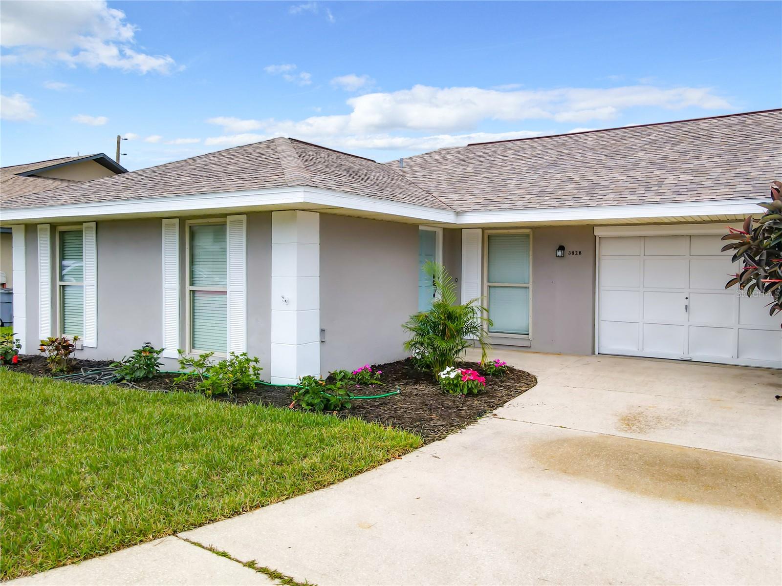 This awesome single-family home is located on a cul-de-sac road in a quiet neighborhood just a short walk (1,100') to the no-drive beach.  The home is solid concrete block located in a non-flood zone (X zone) for peace of mind.  Newer roof, A/C, and hot water heater.  Vinyl PVC fenced backyard provides privacy.  Home has tile throughout. The primary bedroom has a private bath with tiled shower and walk-in closet.   Washer and dryer hookup is in the garage.  This home is centrally located to schools, churches, shopping and dining.