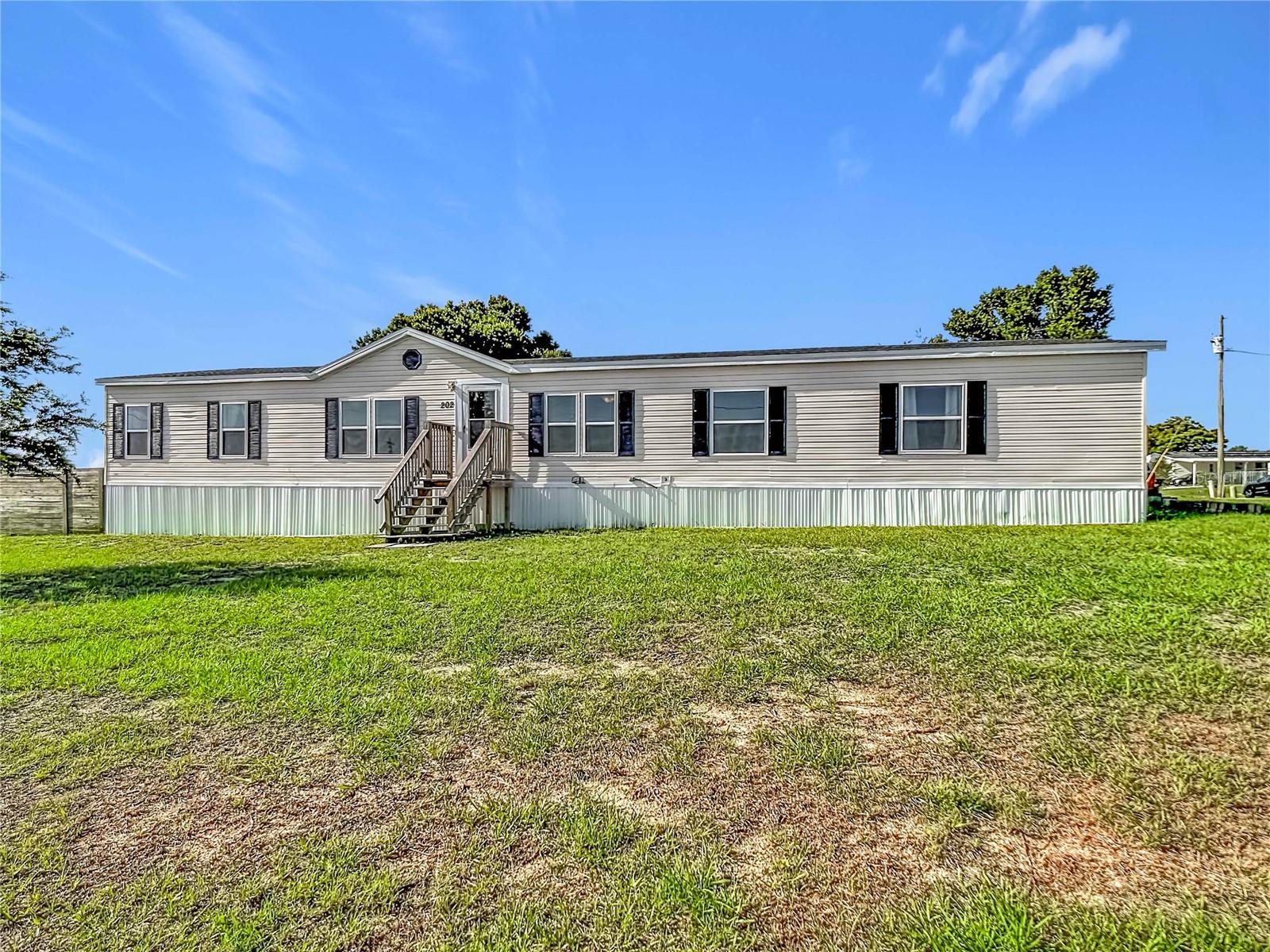 Spacious and Move-In Ready!  Offering 2,356 heated square feet, this beautifully updated 4-bedroom, 2-bath home combines comfort, space, and convenience. The split bedroom floor plan features generously sized rooms, with walk-in closets in three bedrooms, providing abundant storage throughout.  The remodeled kitchen is sure to impress with granite countertops, tile backsplash, stainless steel appliances, and an abundance of new cabinetry. The inviting living room features a fireplace, creating the perfect space to gather and unwind.  Recent updates include double-pane windows, luxury vinyl flooring throughout the main living areas and bedrooms, a new roof (2026), new hot water heater (2026), and an owned water treatment system. The A/C is approximately six years old. An inside laundry room with additional storage cabinets adds even more functionality.  Seller will consider assisting with closing costs.  Conveniently located near US Hwy 27 and Cypress Gardens Boulevard, this home offers easy access for commuting, shopping, dining, and entertainment.  Be sure to watch the attached 3-D Interactive Tour for a complete virtual walkthrough of this ready-to-move-in home.