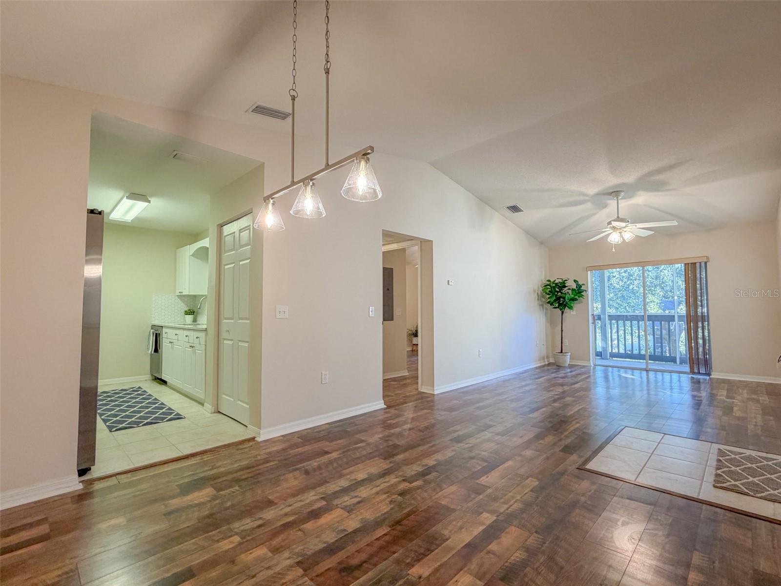 CURRENTLY AVAILABLE!! CORNER UNIT WITH VAULTED CEILINGS, PRIVATE BALCONY AND LAKEFRONT COMMUNITY- Welcome to your new retreat in the highly sought-after chain of lakes community of Park Lake — where comfort, style, and location come together beautifully. Step inside this charming one-bedroom, one-bath home and you’ll immediately notice the open feel created by vaulted ceilings and luxury vinyl flooring throughout the main living areas. The kitchen is a true highlight, featuring quartz countertops, sleek cabinets, stylish backsplash a modern tile floor, and all-new stainless steel appliances — including a five-burner stove, low-profile microwave, and refrigerator with exterior ice-maker. Thoughtful upgrades like new sinks, faucets, a garbage disposal, and modern lighting add both function and sophistication.
The bathroom feels spa-like with a sleek tile shower, coordinating tile floor, quartz countertop, new sink, fixtures, and an elegant multi-illuminating with anti fog mirror that provides perfect lighting for any time of day. Two sliding glass doors — one from the living room and another from the bedroom — open to your private screened balcony, filling the home with natural light and offering peaceful outdoor views. The spacious bedroom includes a large closet, providing plenty of storage. Updated blinds, modern ceiling fans, and an inside utility with a washer/dryer combo add even more comfort and convenience. One designated parking space along with additional parking nearby. 
Just five minutes from vibrant downtown Winter Haven and next door to the state-of-the-art Advent Health Field House — complete with basketball courts and an Olympic-size swimming pool — this home’s location can’t be beat. Park Lake sits on the shores of beautiful Lake Lulu, where residents can fish from the pier or enjoy skiing right on the water. Perfectly centered near shopping, dining, and grocery stores, this prime location truly offers it all — comfort, convenience, and the best of the Florida lifestyle.
