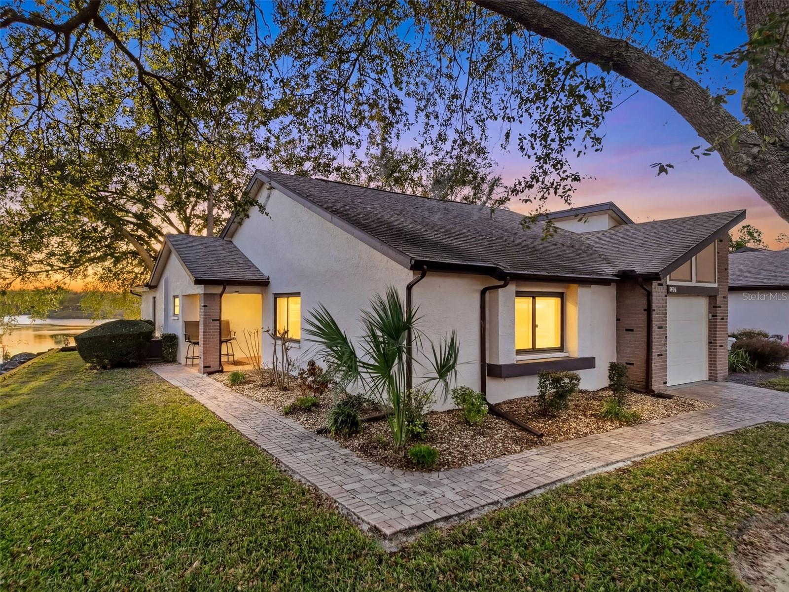 Welcome to 7406 Heather Walk Dr, Weeki Wachee, FL 34613 — a rare 3-bedroom, 2-bath corner unit with a 1-car garage and beautiful water views, offering comfort, privacy, and peace of mind.

This light-filled home features skylights that enhance the spacious open layout with abundant natural light. The living and dining areas are perfectly positioned to capture serene water views, creating a relaxing backdrop for everyday living. As a desirable corner unit, you’ll enjoy added privacy and extra windows throughout.

The kitchen is equipped with newer appliances, including a convection oven with air fryer and a refrigerator featuring an additional freezer door — ideal for convenience and entertaining. Generous bedroom sizes and large walk-in closets provide exceptional storage space, while the primary suite offers comfort and a private bath.

The property is high and dry with no history of flooding, providing added confidence and security for homeowners.

Residents enjoy resort-style amenities including a heated saltwater pool, hot tub/spa, community clubhouse, and BBQ area — perfect for social gatherings and enjoying Florida’s year-round sunshine.

The HOA covers exterior maintenance, trash removal, cable, and internet, delivering a truly low-maintenance lifestyle.

HOA fees include trash service, yard maintenance, exterior villa maintenance, internet, cable, access to the community pool, clubhouse, fitness center, and gated guard service from 4 PM to 12 AM

Whether you’re looking for a full-time residence or seasonal retreat, this waterfront corner unit combines location, upgrades, and lifestyle in one exceptional opportunity. Schedule your private showing today.