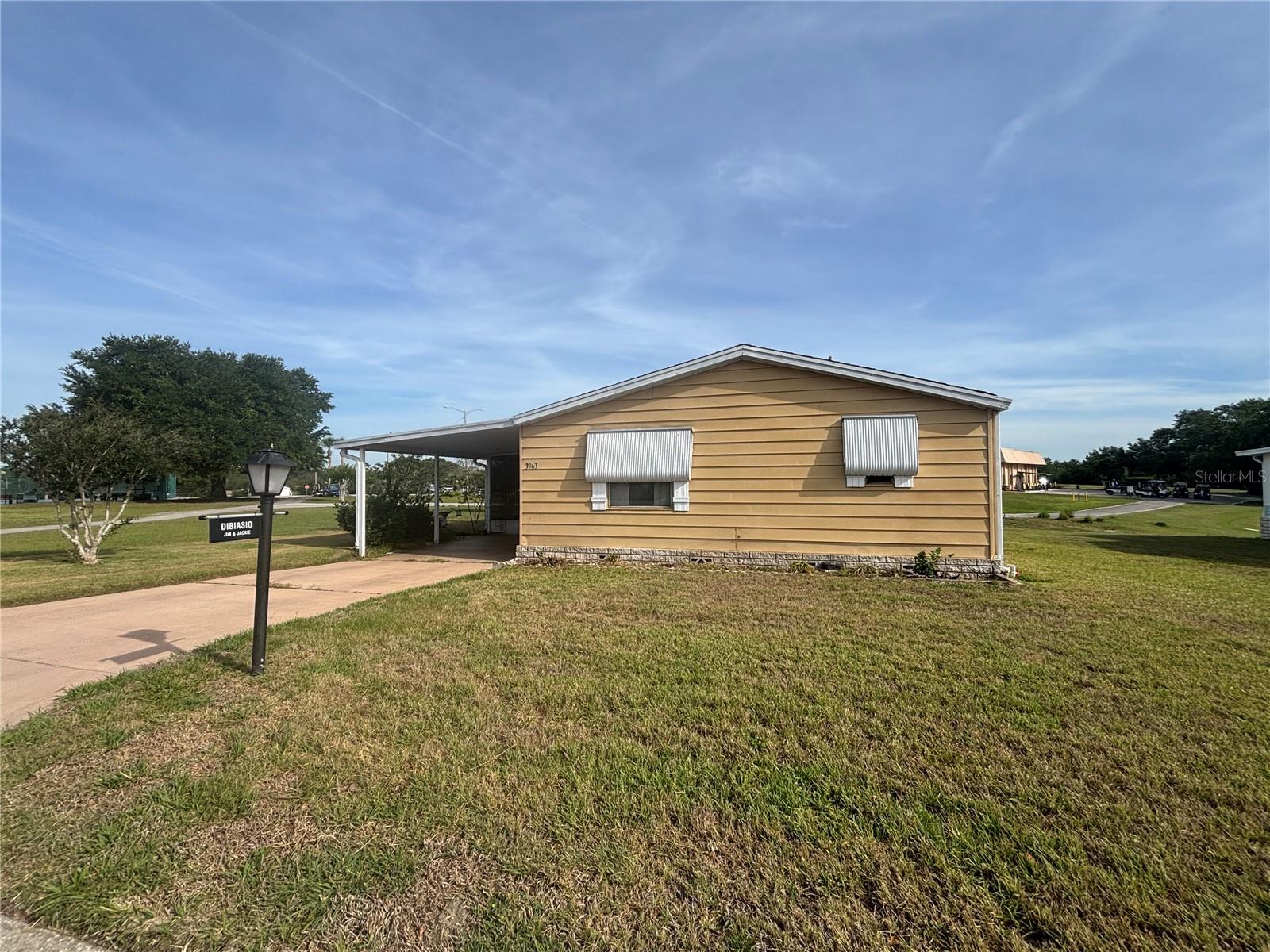 **Welcome to Zellwood Station, the sought-after 55+ golf community. **  
This charming 2-bedroom, 2-bath home features a bright and airy open-concept living and dining area. Updated kitchen with lots of cabinet space. Enjoy peaceful views of the putting green and golf course right from your screened-in patio. You’re just steps away from a great meal at The WhistleStop, Zellwood’s on-site restaurant and many activities in the community room! Perfect location for golfers!
Whether you’re looking for a relaxing retreat or an income-producing opportunity, this home is a wonderful find.
Zellwood Station is located approximately 25 miles north of Orlando, conveniently close to the 429 expressway, which allows for easy access to Orlando, the International Orlando airport, and all the area attractions. You're just a 20-minute drive from historic downtown Mount Dora known for its charming restaurant, boutique shopping, and year-round festivals!
This gem won't last-contact me today to book your private tour!