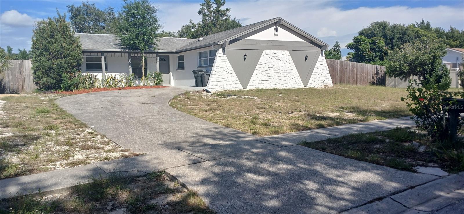 Virtually Staged. Just listed these four bedrooms plus home office or fifth bedroom. Beautifully renovated and spacious 1898 Htd Sq'. Garage was enclosed for extra room or storage. Huge, fenced yard with *plenty of room for a pool.
   Home is completely renovated and all appliances are included. There's no flood insurance required here the home is high and dry. There are no deed restrictions, No HOA! The property is large enough to park your boat or RV. This home just blocks from the Tarpon Beaches and Howard Park. Tarpon Springs is a famous town that offers you two beaches and plenty of antique shopping downtown. The schools are highly rated. You are just minutes to all shopping and 29 miles to Tampa Airport.