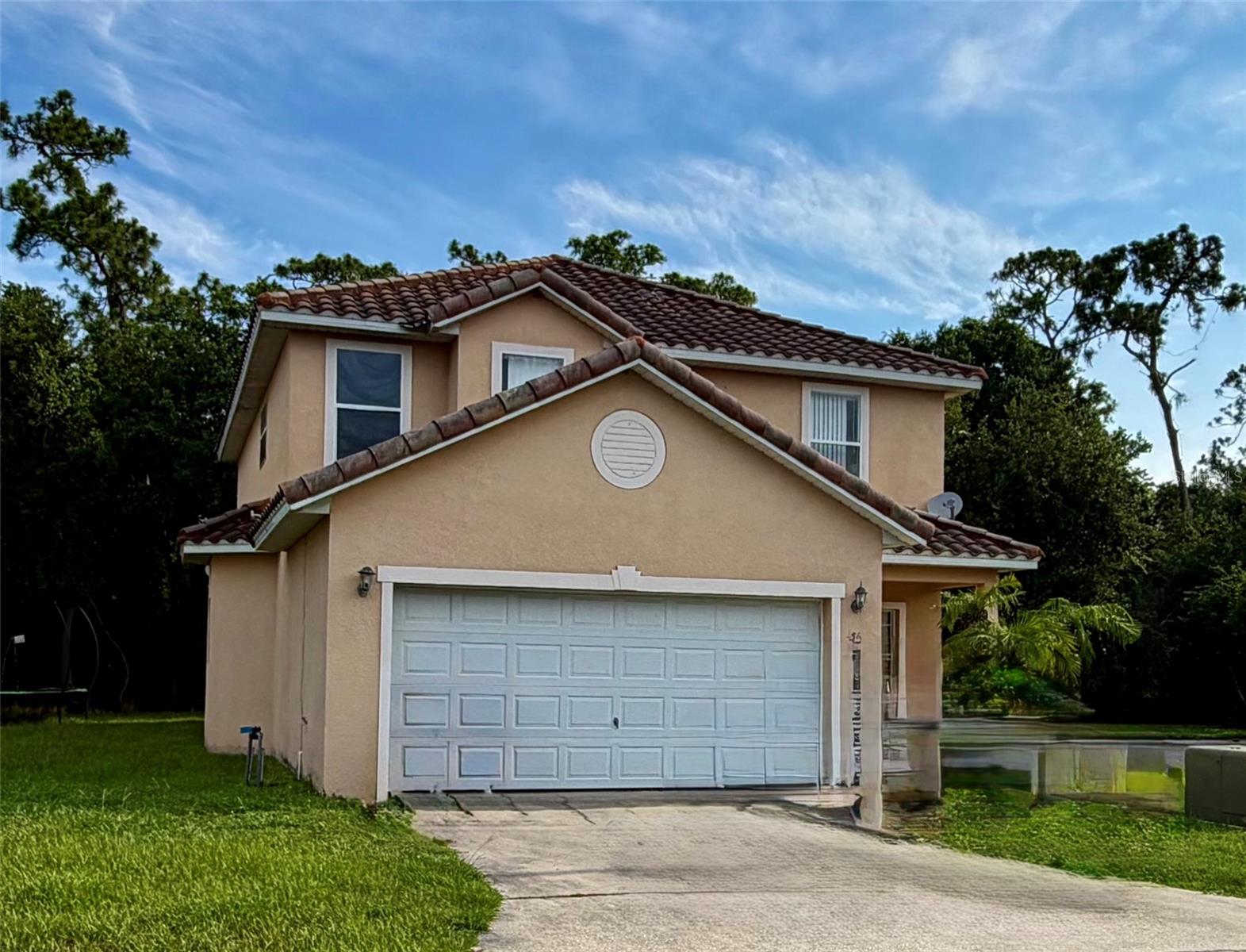 4/3 Two-story house in a small gated community in the heart of Kissimmee. Wake up to gorgeous lake views, with beautiful conservation behind the home that backs onto Shingle Creek. Spacious, open living, dining, and family rooms. Two-car garage, quiet neighborhood, walking distance to Wal-Mart Super-Center, and conveniently positioned close to shopping, family activities, and Disney. The HOA includes cable, security/surveillance cameras, and even lawn service! You will feel like you are on vacation, overlooking a peaceful lake and conservation area in the back. Home includes all appliances and furniture. There are two oversized master bedrooms, and both master bathrooms have separate showers and tubs. All this and more is waiting for you to live in or to make money as an investment property! This house needs new flooring and paint and will be ready for you and your family. Close to everything.