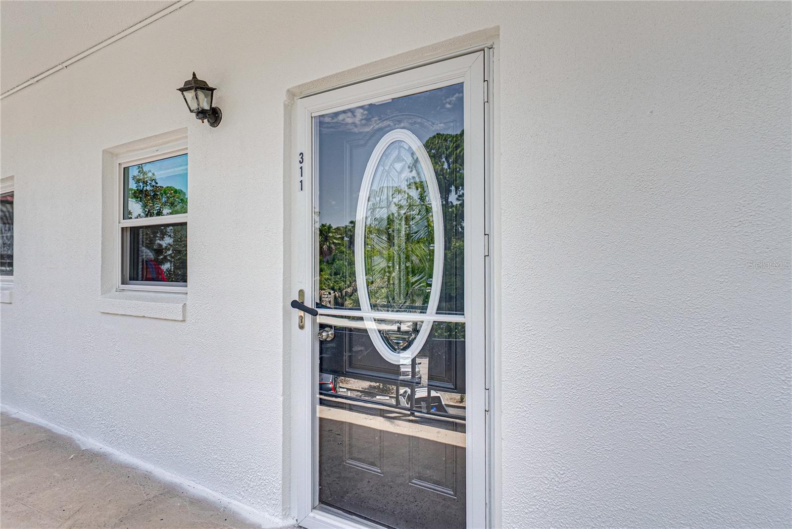 WELCOME TO THE SEVILLE BUILDING IN BEAUTIFUL ORCHID SPRINGS.  THIS IS A LARGE (1,378 SQUARE FEET) TWO BEDROOM TWO BATH UNIT LOCATED ON THE THIRD FLOOR.  ELEVATORS ARE POSITIONED IN THE CENTER OF THE BUILDING FOR RESIDENTS CONVENIENCE.  THIS UNIT HAS BEEN UPGRADED AND IS READY FOR IT'S NEW OWNERS.  THIS FLOORPLAN HAS A SPLIT- BEDROOM PLAN.  THE RESIDENCE OVERLOOKS A BEAUTIFUL TROPICAL LAGOON.  THE ROOF WAS REPLACED IN 2025 AND THE ENTIRE BUILDING IS CURRENTLY BEING PAINTED.  THE GALLEY KITCHEN HAS BEEN REDONE AND HAS STAINLESS STEEL APPLIANCES.  THE PRIMARY BEDROOM IS SPACIOUS WITH A REMODELED  ENSUITE BATH WITH A HUGE WALK-IN CLOSET.  THE SECOND BEDROOM HAS ACCESS TO ITS OWN UPDATED BATH ALSO.  THE MONTHLY HOA FEE COVERS, GAS, WATER, TRASH, SEWER, CLUBHOUSE & POOL, EXTERIOR MAINTENANCE AND GROUNDS UPKEEP.  THIS WELL-KEPT HOME IS PRICED TO SELL.