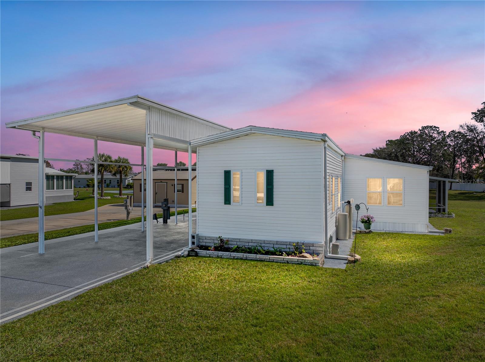 Unlock the ultimate RV lifestyle in this beautifully renovated Jacobsen manufactured home, ideally located in the highly desirable Mount Olive Shores community. From the moment you enter, the completely transformed interior showcases quality craftsmanship and modern design throughout.

At the heart of the home, the showpiece kitchen features sleek contemporary cabinetry, elegant solid-surface countertops, and brand-new stainless steel appliances — a true chef’s dream and perfectly suited for entertaining.

This exceptional property has been thoughtfully upgraded to provide comfort, security, and long-term peace of mind, including:

• New windows and exterior doors
• Brand-new roof
• Updated plumbing system
• State-of-the-art anchoring system with Foundation Certification Letter
• Newly constructed private in-law suite with separate entrance and full bath
* New Luxury Vinyl Plank Flooring in the Master Suite & Master Bath

Step outside and enjoy Florida living at its finest in the expansive screened room — ideal for relaxing evenings or hosting guests. A spacious storage shed complete with washer and dryer adds valuable functionality and convenience.

Located just 3.5 miles from I-4, the community offers easy access to shopping, medical facilities, and major airports, while maintaining the privacy and security of a gated setting. Mount Olive Shores is a welcoming, Class A motorhome deed-restricted community, requiring ownership or lease of a Class A motorhome the first year of residency — ensuring the neighborhood remains tailored specifically to RV enthusiasts.

Further enhancing the lifestyle, the community now features a brand-new 5,000-square-foot heated and cooled Community Center. This impressive facility includes a full kitchen, regulation-size shuffleboard and pool tables, dart board, arcade games, dedicated card room, library, vending area, and a covered BBQ lanai ideal for gatherings. Residents enjoy an active calendar of seasonal events such as bingo, karaoke nights, potluck dinners, holiday celebrations, and numerous social activities throughout the year.

This is more than a home — it is a vibrant, RV-centered lifestyle designed for comfort, connection, and enjoyment. An exceptional opportunity awaits.