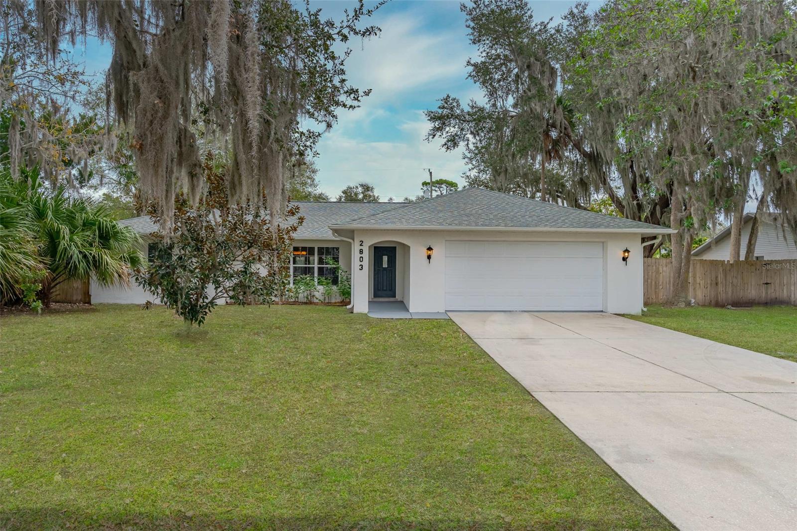 SPACIOUS CUSTOM BLOCK HOME ON THREE LOTS BUILT BY MERRICK HOME BUILDERS. THIS WELL APPOINTED ONE OWNER HOME HAS LARGE ROOMS, HUGE FENCED BACK YARD, FRESH PAINT, AND IS MOVE IN READY. SEMI-OPEN KITCHEN WITH LOTS OF CABINET STORAGE, PANTRY, AND COUNTER TOP SPACE WITH A BREAKFAST BAR. THE LARGE 22X15 LIVINGROOM OFFERS MORE THAN ENOUGH ROOM FOR FAMILY GATHERINGS AND ENTERTAINING. THERE'S A FORMAL DINIGROOM SPACE WITH GLASSED FRENCH DOORS LEADING TO A BOUNS ROOM WITH LOTS OF SUNLIGHT AND WINDOWS. THE BONUS ROOM HAS MANY POSSIBILITIES, HOME OFFICE, MEDIA ROOM, CRAFTS ROOM, OR GREAT AREA FOR INDOOR SPA WITH 220V OUTLET ALREADY INSTALLED. LARGER MASTER BEDROOM WITH WALK IN CLOSET, MASTERBATH HAS A WALK IN SHOWER. SOUGHT AFTER SPLIT PLAN WITH ROOMY GUEST BEDROOMS. THERE'S AN INDOOR LAUNDRY ROOM WITH UTILITY SINK, AND ROOM FOR ADDITIONAL STORAGE. WASHER AND DRYER ARE INCLUDED! FULL SIZE TWO CAR GARAGE WITH DOOR OPENER AND FRESHLY PAINTED FLOOR. ENJOY THE OUTDOORS IN THE LARGE PRIVATE BACKYARD WITH FULL LENGTH CONCRETE PATIO AND THE ENTIRE BACKYARD IS COMPLETELY PRIVACY FENCED. PLENTY OF ROOM TO ADD A POOL AND STILL ROOM TO PARK YOUR RV AND BOAT. ARCHITECTURAL SHINGLE ROOF ONLY 2 YEARS OLD. GUTTERS ON ALL SIDES OF HOME. CLOSE TO THE BEACH, BOAT LAUNCHES, SCHOOLS, PARKS, DINING, SHOPPING AND I95. WON'T LAST LONG CALL NOW FOR A PRIVATE SHOWING! ;Water: City