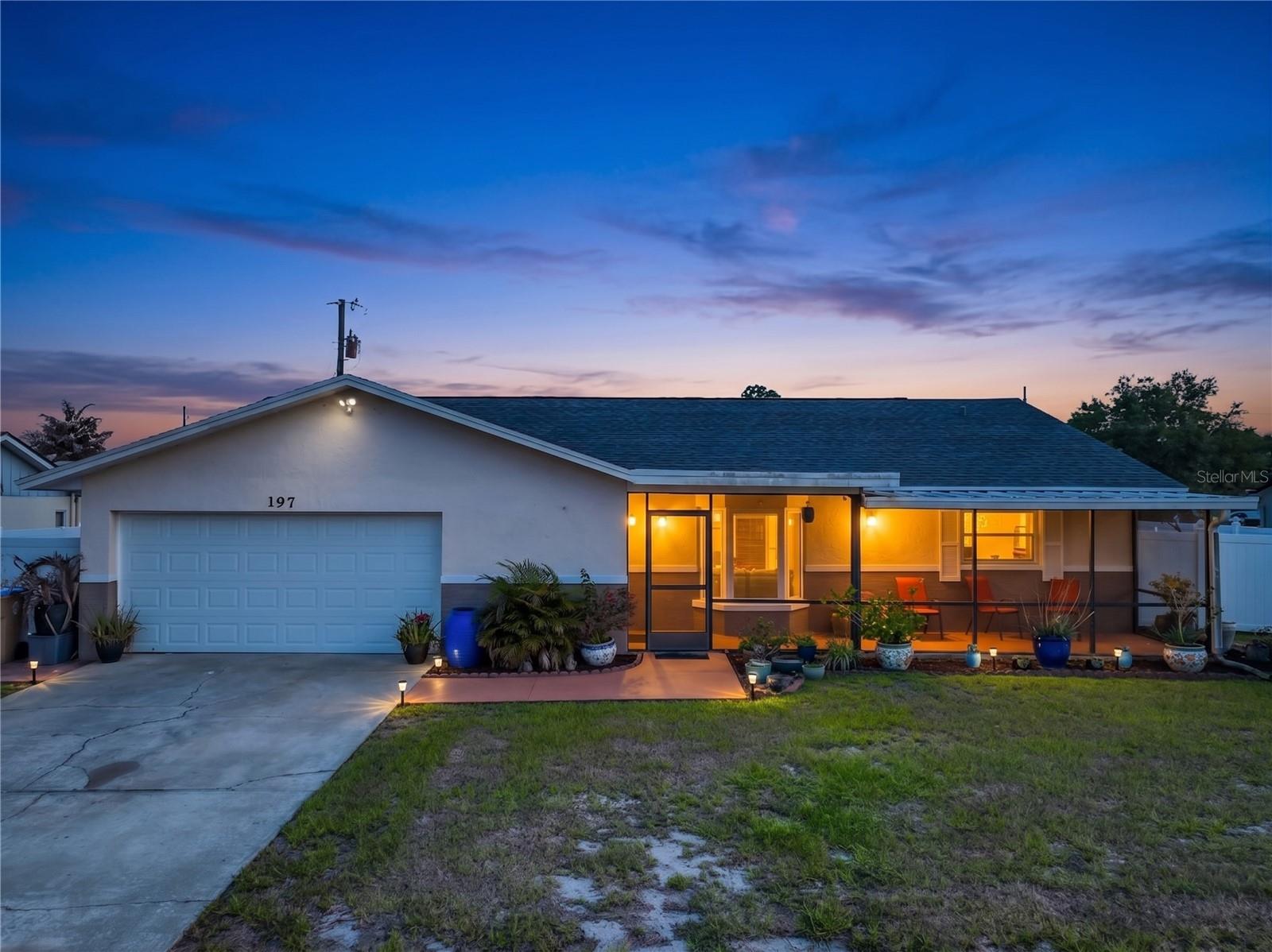 197 Tulip Way welcomes you with comfort, style, and an impressive list of upgrades that make this home truly move in ready. Situated on a desirable corner lot in Kissimmee, this beautifully maintained 3 bedroom, 2 bath pool home offers the perfect blend of indoor comfort and outdoor entertaining.

Step inside to discover ceramic tile flooring throughout the entire home with no carpet since 2019, creating a clean and modern feel with easy maintenance. The remodeled bathrooms completed in 2020 add a fresh contemporary touch, while the spacious layout offers inviting living areas filled with natural light.

The backyard is designed for enjoying the Florida lifestyle. Relax in your private saltwater pool refurbished in 2021, surrounded by an expanded pool enclosure completed in 2022 for even more outdoor enjoyment. A beautiful pergola added in 2022 creates the perfect setting for gatherings, cookouts, or peaceful evenings at home. The privacy fence was expanded in 2019, and extensive concrete improvements completed in 2023 include a large 22x40 cemented and paved patio area with additional concrete space ideal for entertaining, recreation, or extra functionality.

This home also offers valuable major updates including a NEW roof installed in July 2023 and a NEW 4.5 ton AC unit installed in July 2025 for added peace of mind. Additional features include stainless steel kitchen appliances, double pane windows, recessed lighting, a tankless water heater, programmable Nest thermostat, ceiling fans, oversized garage with storage, pull down attic access, sprinkler system, automatic pool vacuum, and screened lanais perfect for year round Florida living.

Conveniently located near parks, shopping, restaurants, libraries, major roadways, and Central Florida attractions, 197 Tulip Way delivers the space, upgrades, and lifestyle buyers are searching for. Poolside living, modern upgrades, and room to entertain all come together in one exceptional property, so schedule your private showing today before this opportunity is gone.