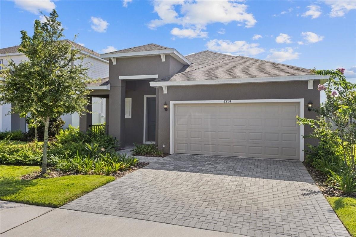 The Daytona is a spacious 4 bed, 3 bath single story home with a 2-car garage. The front porch and foyer flow into the home's gathering room and open concept kitchen and dining room overlooking the covered lanai. The master suite has a spacious ensuite bathroom with dual sinks and a walk-in closet. A room with a walk in closet and full bathroom can be used as a fourth bedroom or study with double French doors. Two bedrooms and an additional bathroom complete this smartly designed floorplan. These images are for illustrative purposes only and may not depict the exact specifications or details of the actual home available for sale.
