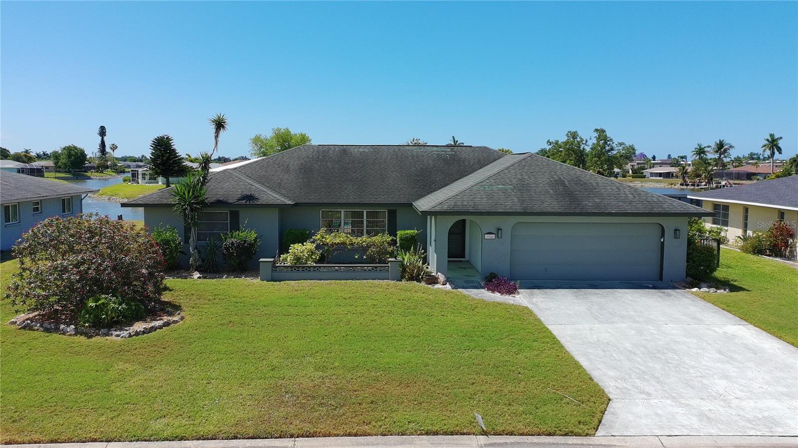 Come home to this light, bright, cozy split bedroom modern designed home, overlooking a true Floridian scape of Claw Lake and its natural setting in your back yard. 
This home features fresh appointments of lighting and fresh paint throughout the home inside and out. The kitchen displays light cabinets, granite counter tops and laminate wood floors throughout. 
The bedrooms are equipped with large walk in closets with quick access to bathrooms. Nice size laundry room attached to garage with good size storage closets.  There is a breakfast nook in addition to a formal
dining room. There are great open spaces for family gatherings spilling over into the extended lanai and pool. Just past the pool cage sits a solid dock  for enjoyment of more 
leisure activity at the waters edge. This location is very close by to schools, shopping, YMCA, beaches and downtown Venice. This property has amazing value and affordability for 
any stage of life. It wont be available for very long. Come and see it for yourself!