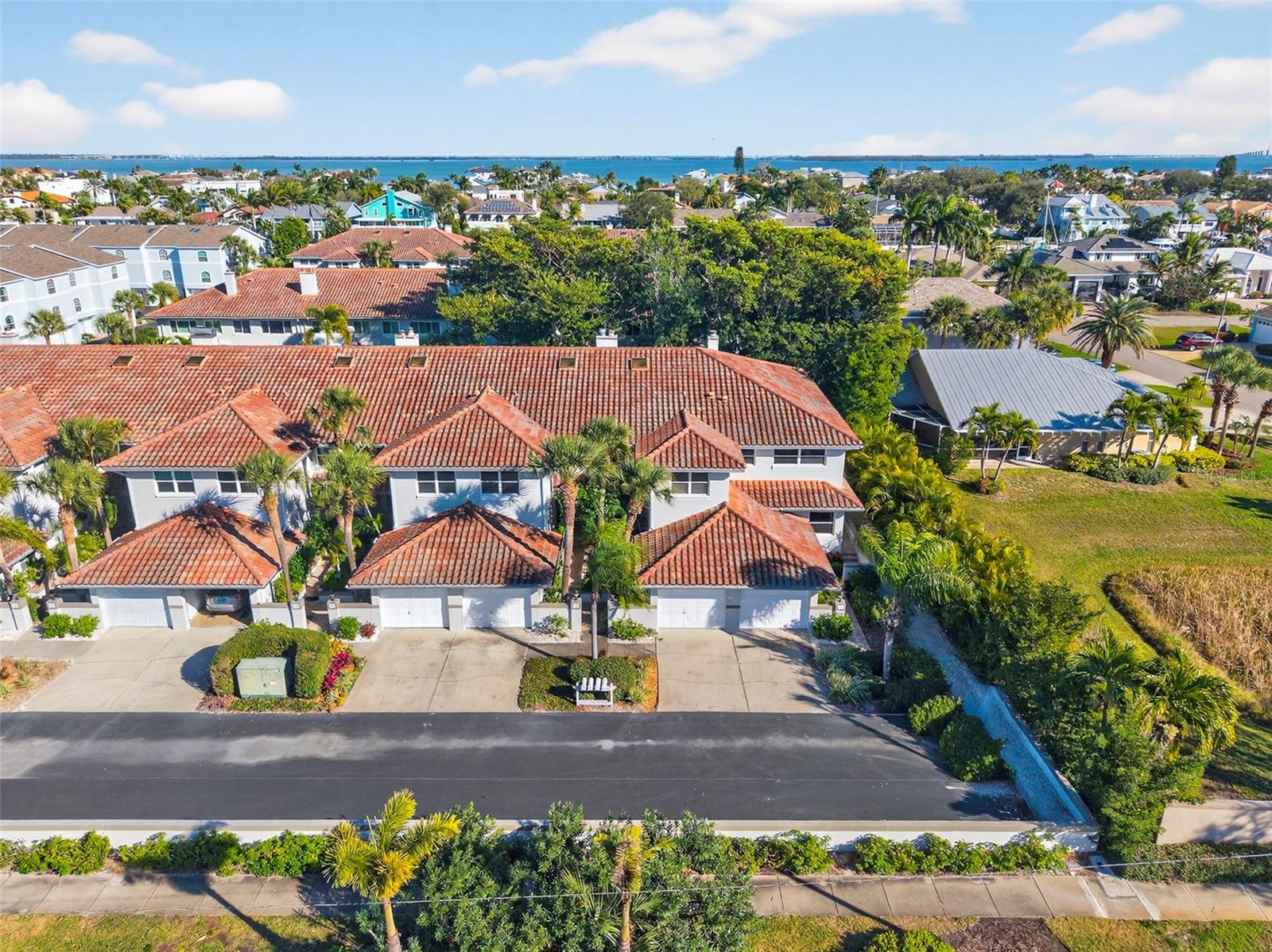 LIVE THE COASTAL LIFESTYLE YOU’VE BEEN WAITING FOR IN TIERRA VERDE’S WATERFRONT COMMUNITY OF VILLA DEL MAR. This well built townhome offers 1,820 square feet of light and bright living space with 3 bedrooms, 2.5 bathrooms, and a one car attached garage, all constructed with solid block and equipped with hurricane shutters for added peace of mind.
Inside, you will find a clean and inviting layout filled with natural light, complemented by tasteful finishes and a cozy wood burning fireplace. French doors open directly to the community pool and hot tub area, creating a seamless indoor outdoor flow that is ideal for entertaining or everyday relaxation. While the unit is not waterfront facing, it benefits from immediate access to the community’s waterfront setting and public dock, allowing you to fully embrace the Tierra Verde lifestyle.
The association offers exceptional value by covering nearly all major expenses including internet, cable, flood insurance, exterior maintenance, roof, water, sewer, and trash, leaving electric as the primary utility. This makes for a truly low maintenance ownership experience that is ideal for a primary residence, second home, or lock and leave coastal retreat.
Perfectly positioned just minutes from St Petersburg’s award winning beaches, downtown St Petersburg, private golf courses, marinas, and some of the area’s best dining, this location delivers convenience without sacrificing the laid back island feel. Opportunities to own in Villa Del Mar are limited, making this an exceptional chance to secure your place in one of Tierra Verde’s most desirable waterfront communities.