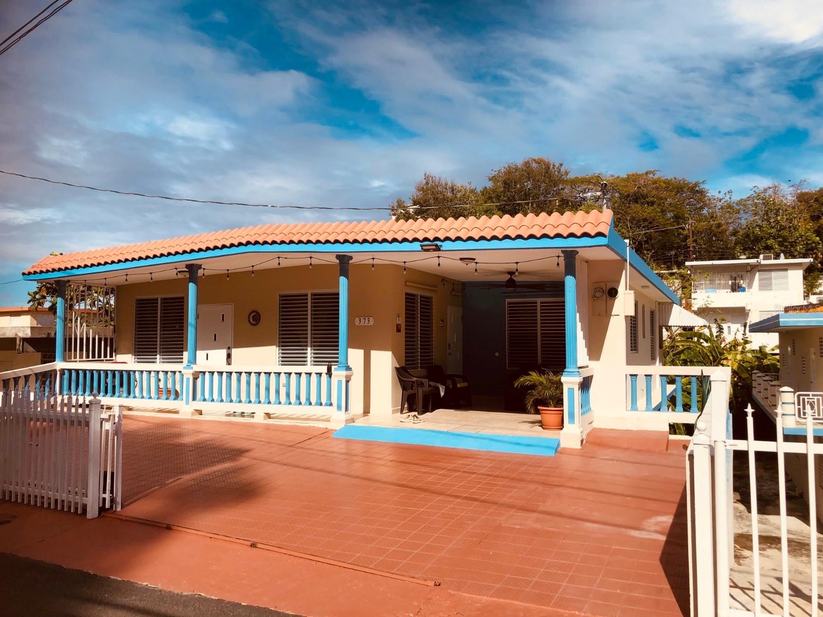 Prime Multifamily Investment in Rincón Town Center  
Discover a rare opportunity in Bo. Pueblo with this well-located two-level, 5-bedroom, 3-bath multi-unit property offering excellent income potential in one of Rincón’s most walkable and desirable areas. The first floor offers a 3BR/2BA unit with its own kitchen, laundry, living room, and terrace—currently operating as an Airbnb. The second floor features a 2BR/1BA unit with private kitchen, living room, laundry, and a covered walkout terrace—currently used as the owner’s living space, with ample room to add a pool if desired.
The property also includes solar panels; batteries will need updating, offering an opportunity for future enhancement.
Just steps from Rincón’s vibrant town square, tenants enjoy easy access to restaurants, cafés, shops, the weekly ArtWalk, and essential services. Beaches, the marina, and popular surf spots are only minutes away, appealing to both long-term residents and short-term visitors seeking the Rincón lifestyle.
With dual rental streams, strong year-round demand, and excellent walkability, this property stands out as a compelling investment in a thriving market. Don’t miss this exceptional multifamily opportunity in Rincón.