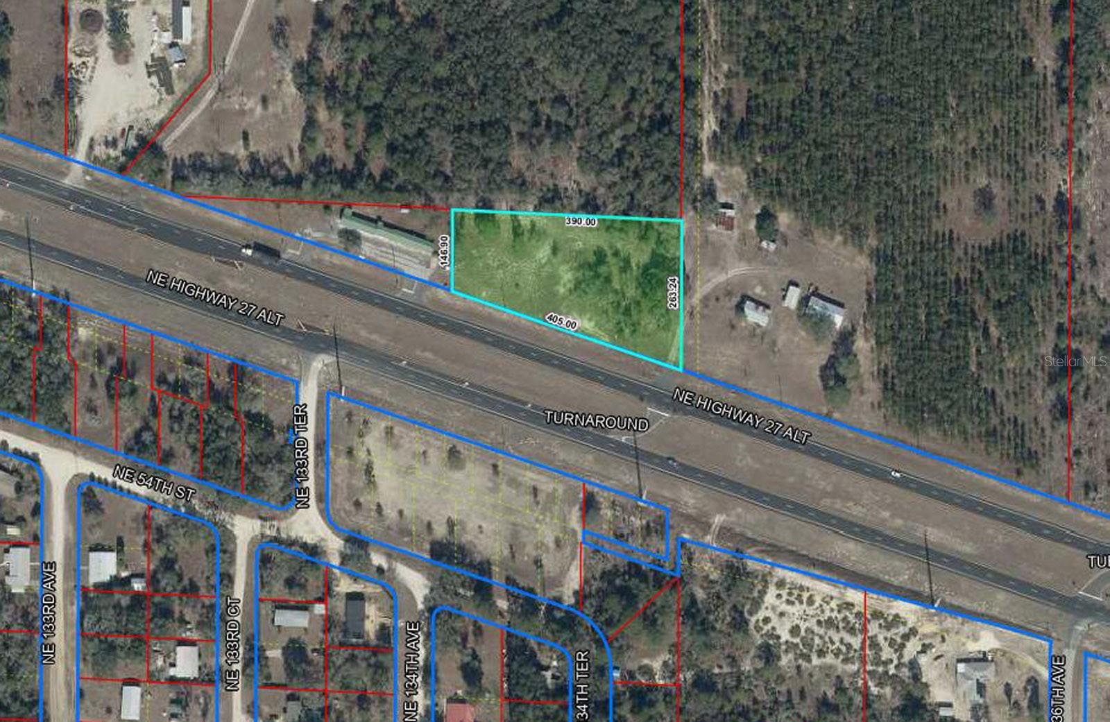 HIGHWAY FRONTAGE ACREAGE BETWEEN WILLISTON & BRONSON
This 1.76 acre parcel is ideally located along Highway 27Alt, a four-lane divided highway centrally positioned between Williston and Bronson. Offering over 400 feet of paved road frontage, the property provides excellent access and convenience while maintaining a rural setting.

Zoned Rural Residential, the property allows for either a site-built or manufactured home, giving you flexibility to design and build to suit your needs. Its location adjacent to an existing strip center adds nearby conveniences without sacrificing space or privacy.

With its generous acreage, strong road frontage, and central location, this property is well suited for those seeking room to build with easy access to surrounding communities.