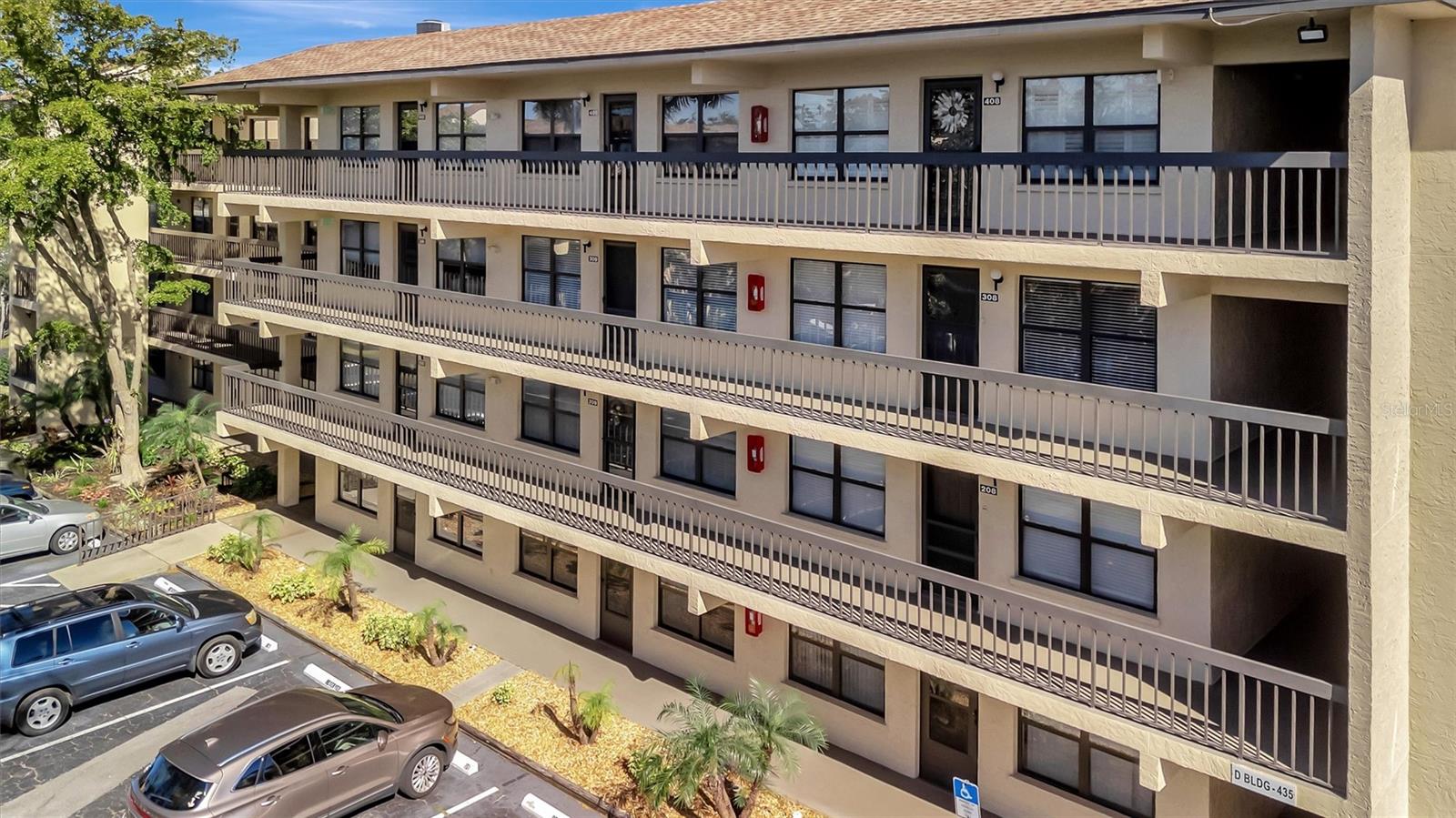 This beautifully renovated, turn-key furnished condo is a hidden oasis in the heart of Bradenton, with location as a standout feature. It offers easy access to Sarasota, Anna Maria Island, Gulf beaches, Bradenton’s keys, I-75, and downtown. This spacious 1-bedroom, 1.5-bath home, just under 1,000 square feet, is filled with high-end upgrades and comes completely furnished, including all Coastal décor, linens, and kitchenware—making it truly move-in ready. Quality tile plank flooring flows throughout, enhancing the clean, modern design. The extended kitchen is a showstopper, featuring an expansive quartz-topped island that blends style and function—perfect for meal prep, casual dining, or entertaining. Additional upgrades include a designer backsplash, soft-close drawers, raised soffits, and stainless steel appliances, offering both elegance and practicality. Stylish plantation shutters on the front and back windows, along with center-opening textured vertical blinds, add to the long list of extras. Upgraded lighting, outlets, and fans elevate the contemporary ambiance, while a front-door sliding screen allows for refreshing cross breezes. This top-floor unit with no neighbors above enjoys peaceful living with an abundance of natural light and serene water views, accompanied by the soothing sounds of a fountain. The lanai, finished with matching wood plank tile, overlooks lush landscaping, creating a peaceful retreat. Situated in Woodpark at DeSoto Square, a gated 55+ community, residents can enjoy amenities like a heated pool, spa, and scenic walking paths around the ponds. The building is pet-friendly and includes designated parking plus a storage space for beach gear. With its unbeatable location and tasteful Coastal-inspired design, this home is the ideal Florida getaway, close to Sarasota’s cultural offerings, Bradenton’s Riverwalk, and Tampa’s vibrant attractions.