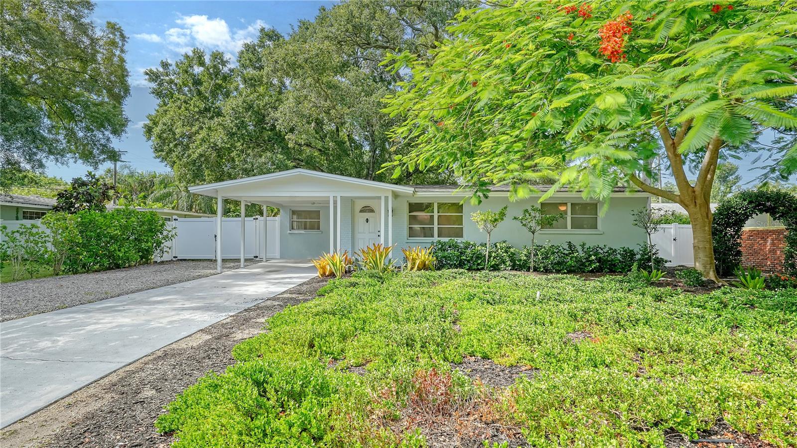 Virtually Staged. Located in Sarasota’s highly sought-after Arlington Park neighborhood, this thoughtfully updated residence delivers a compelling combination of comfort, functionality, and proximity to the city’s most popular destinations. With a renovated three-bedroom layout, the home is move-in ready and ideally positioned just minutes from downtown Sarasota and the area’s renowned Gulf beaches.
The interior features an open-concept design that connects the living, dining, and kitchen areas, creating an easy flow for everyday living and entertaining. Luxury vinyl plank flooring extends throughout the main living spaces, while freshly painted walls in a neutral color palette enhance the light-filled atmosphere. Two updated bathrooms provide modern convenience and a cohesive finish.
The kitchen serves as the heart of the home, offering granite countertops, a full-height tile backsplash, ample cabinetry, and a central island that adds workspace and casual seating. Sliding doors open to a spacious, fully fenced backyard—an inviting outdoor setting with room to relax, garden, or create a customized outdoor retreat. Additional exterior storage adds everyday practicality.
Residents enjoy immediate access to Arlington Park, known for its playground, fountains, walking paths, picnic areas, basketball courts, and tennis facilities—just moments from the front door. The nearby Southside Village offers popular dining spots, local boutiques, and everyday conveniences, while downtown Sarasota’s arts, dining, and waterfront attractions are only a short drive away.
World-famous beaches including Siesta Key Beach and Lido Key are easily accessible, providing endless opportunities for coastal recreation. This Arlington Park home offers an ideal balance of neighborhood charm, city convenience, and access to Sarasota’s best lifestyle amenities.