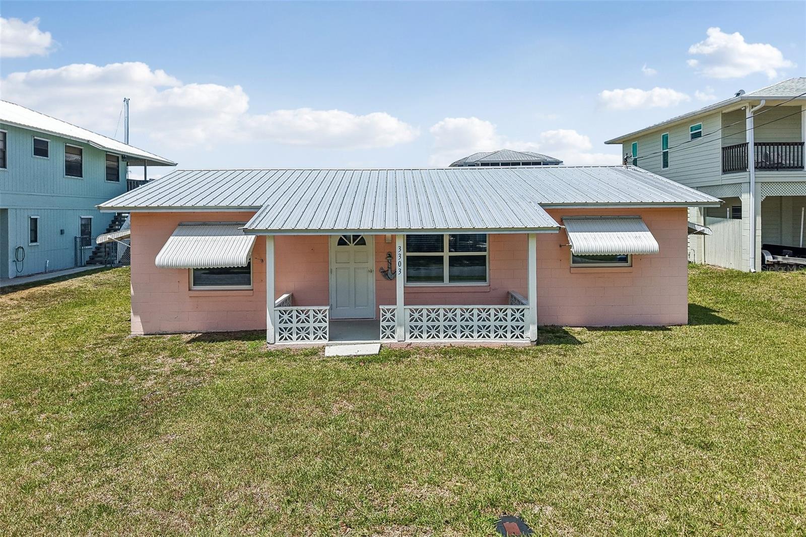 Price improvement! Welcome to your own slice of waterfront paradise. This charming and beautifully renovated 2-bedroom, 2-bathroom home offers the perfect blend of comfort, style and coastal living.  Recently updated kitchen with all new kitchen cabinets and granite counter tops with breakfast bar. All new double pane windows were just installed, the interior was recently painted, and the metal roof is from 2017. This home features an inviting open layout, tile floors throughout, abundant natural light, and a warm, relaxing atmosphere that makes it ideal as a full-time residence, vacation getaway, or investment property.

Step outside and enjoy true Florida living with your own private sparking saltwater pool, that was built in 2021, overlooking a peaceful canal.  Boating enthusiasts will love the direct Gulf access, providing quick and easy trips to open water for fishing, sunset cruises and adventures.  The fenced in back yard and covered patio area is designed for entertaining and relaxation with plenty of room to lounge poolside, host guests, or simply take in the tranquil water views. The oversized utility shed makes a fantastic storage area and can double as your own personal workshop.

Whether you’re searching for a cozy retreat or a waterfront property with exceptional appeal, this home checks every box. Don’t miss this rare opportunity to own a renovated canal-front gem with direct Gulf Access.