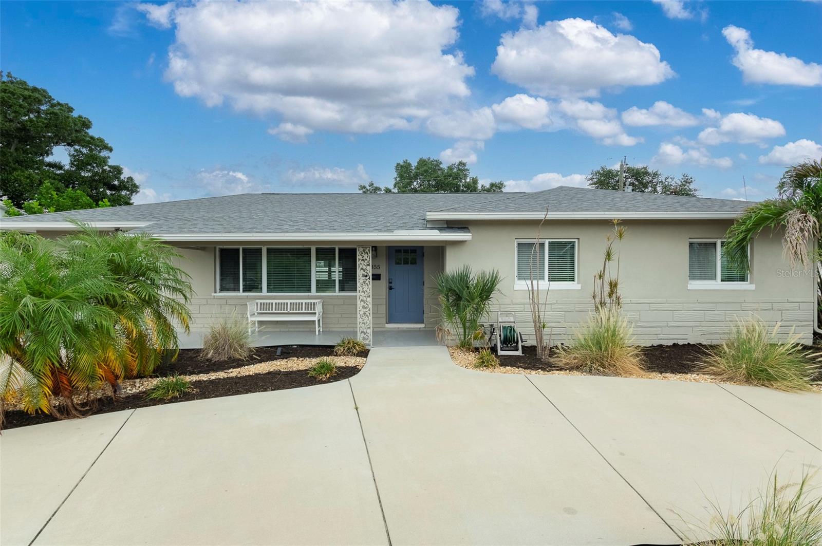 Virtually Staged. Discover this beautifully maintained 3-bedroom, 2-bathroom home in the desirable Holiday Park neighborhood, ideally located less than 5 minutes from Tyrone Square Mall, shopping, dining, and everyday conveniences, and only 10 minutes from the award-winning Gulf beaches.
Beautiful landscaping, a circular driveway, and inviting curb appeal welcome you home. Enjoy your morning coffee or unwind in the evening on the charming covered front porch before stepping inside to an open and spacious floor plan designed for comfortable everyday living and effortless entertaining.
The living room flows seamlessly into the dining area and an updated kitchen featuring granite countertops, brand-new GE stainless steel appliances, and a double-oven range, creating a stylish and functional space for cooking and gathering.
A generous Florida room provides valuable additional living space and opens to a screened lanai overlooking a private, low-maintenance backyard, offering endless possibilities for outdoor entertaining, gardening, or simply enjoying Florida's beautiful weather.
Throughout the home, you'll find newly polished and sealed terrazzo floors, with warm wood flooring in the Florida room, along with abundant storage to keep everything organized. An attached one-car garage adds convenience and additional storage space.
Offering an exceptional location close to shopping, restaurants, parks, downtown St. Petersburg, and the Gulf beaches, this move-in-ready home combines timeless character with thoughtful updates and is ready for its next owner.