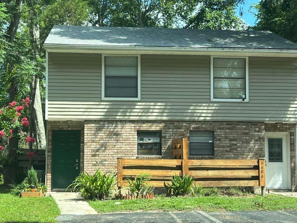 Welcome to this 2-bedroom, 1-bath townhouse in the Haystacks community, conveniently located off Archer Road in southwest Gainesville. This 950 square foot, two-story unit features hardwood floors upstairs, tile on the main level, ceiling fans throughout, and an open patio. The kitchen comes fully equipped with a dishwasher, microwave, range, refrigerator, and built-in microwave. In-unit washer and dryer included. Both bedrooms are upstairs with built-in closets. Community tennis courts on site. Close to restaurants shopping, Shands, UF, and I-75, this property offers a convenient lifestyle for future tenants.