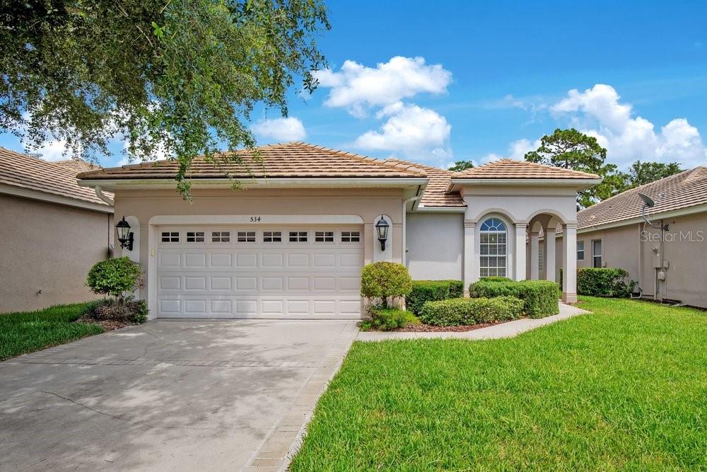Located in one of the GATED sections of DeBARY PLANTATION, home of DeBARY COUNTRY CLUB, this ONE OWNER home has been lovingly cared for and is now ready for a new owner to come in and make more memories here. The floor plan has 2,147 square feet, 3 bedrooms, 2 full baths, 1 half bath, Living Room, Dining Room, Dinette, Family Room, Inside Laundry Room, Covered and Screened-In Lanai and a 2 car garage. The house is very efficiently laid out with every inch being functional and usable space. Some of the upgrades include: TRAY CEILING, 8’ Doors, SOLID SURFACE COUNTER TOPS, STAINLESS STEEL APPLIANCES, CERAMIC TILE and ENGINEERED HARDWOOD FLOORING in all the main areas and carpet in the bedrooms. The Master Suite has 2 large Walk In Closets and the Master Bath has Dual Sinks, a private Water Closet and a Walk-In Shower. In addition, the house comes with a TILE ROOF, BRICK PAVER DRIVEWAY, is super energy efficient and has professional landscaping. There is so much about this house that the only real way to appreciate it is to see it in person. DeBary Plantation is more than just a neighborhood; it's a lifestyle. The community itself is a haven for golf enthusiasts, with the PICTURESQUE FINISHING HOLES providing a stunning backdrop to the exquisite clubhouse. Experience Florida elegance and EXCEPTIONAL AMENITIES within this vibrant semi-private COUNTRY CLUB COMMUNITY. The pride in ownership and the upscale living environment foster a strong sense of community, making 578 Newhall Lane a truly desirable place to call home. Don’t forget to click on the VIRTUAL TOUR button to see 3D HOME WALK THROUGH, then call today to schedule your private showing.